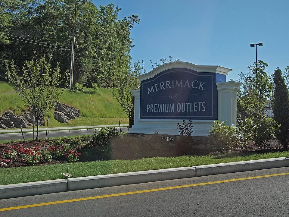 The entrance sign for the Merrimack Premium Outlets, an outdoor shopping mall located in Merrimack, New Hampshire