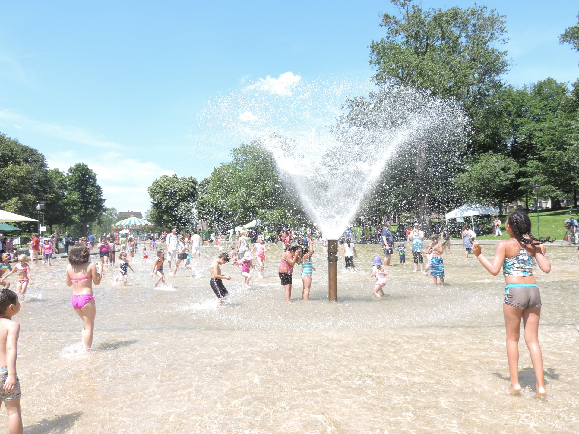 Children Celebrate the Annual Opening of the Frog Pond Spray Pool in Boston Common