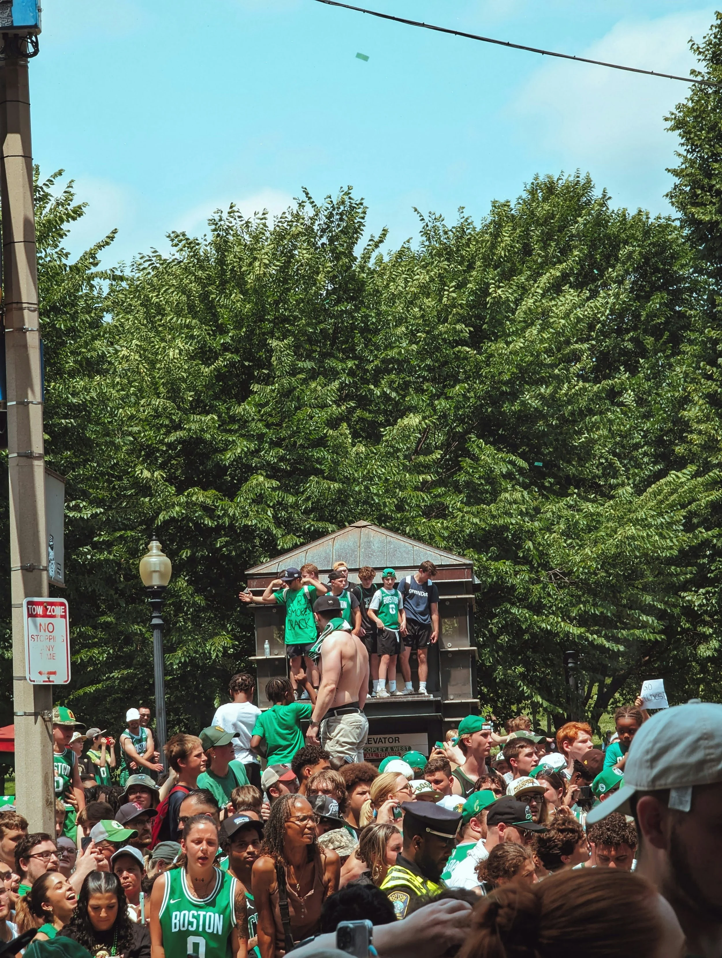 fans celebrating during the Boston Celtics championship parade