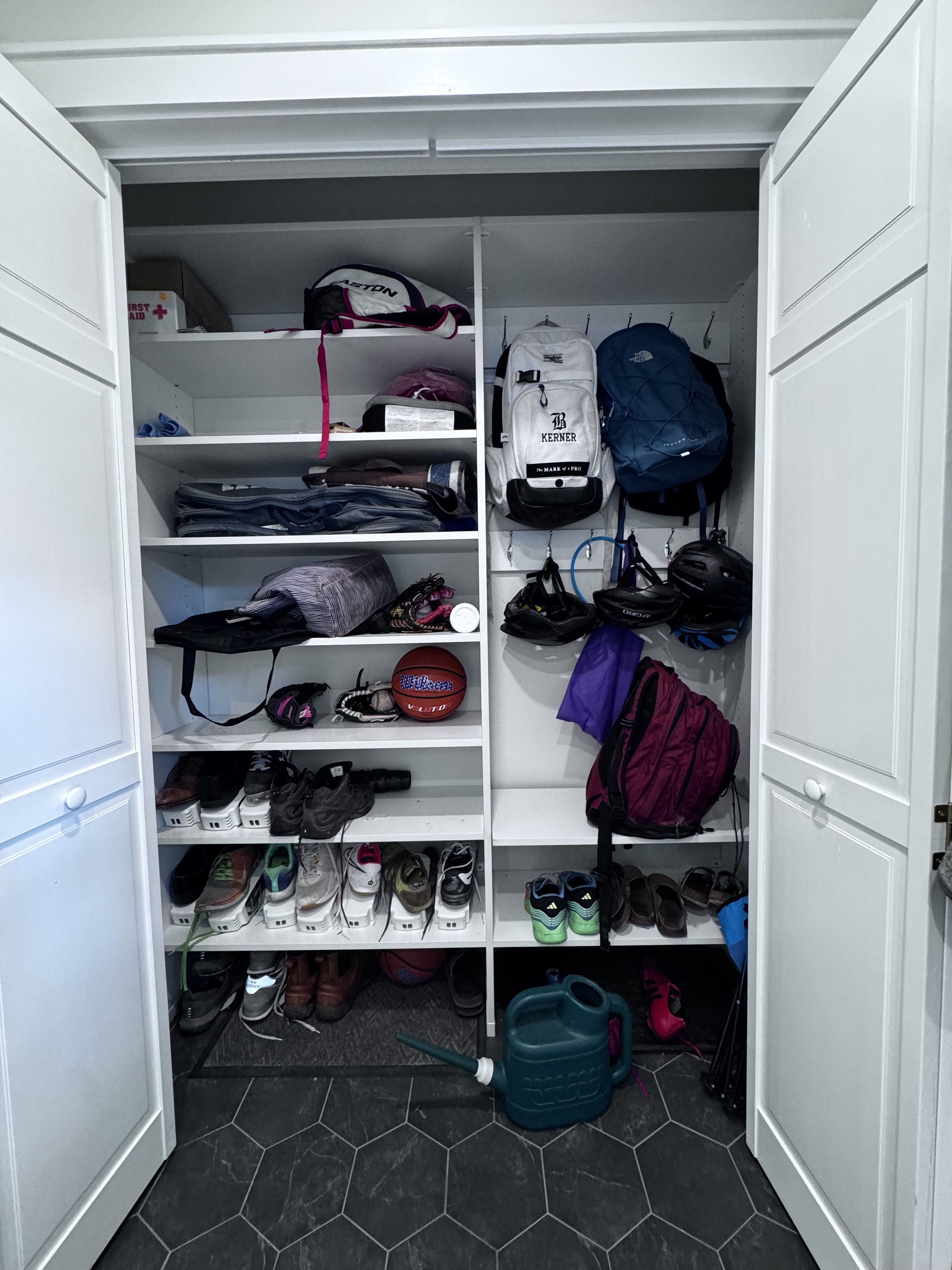 Custom closet in mudroom for Children's items.