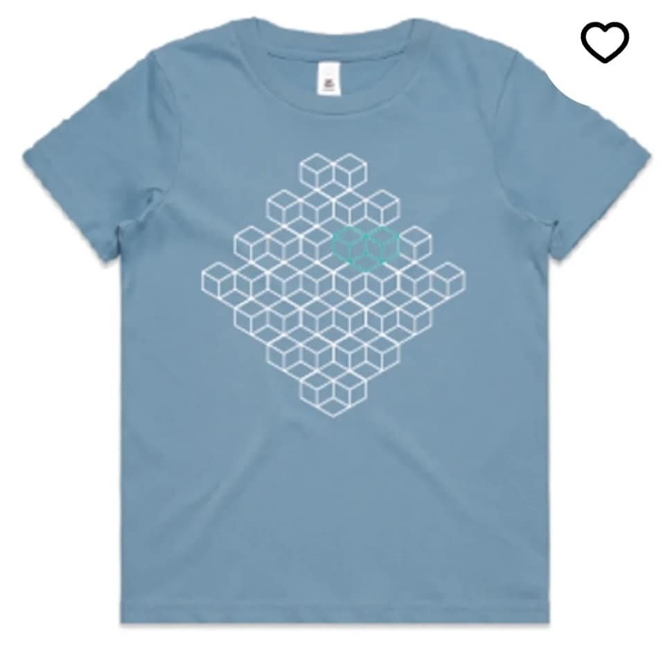 Light blue T-shirt with a geometric honeycomb pattern design in white with a smaller teal snowflake-like shape in the center.