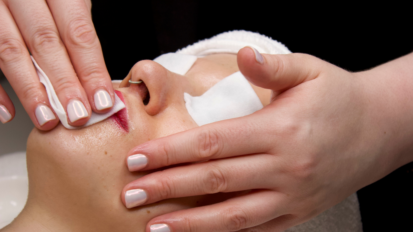 Esthetician Aislinn cleanses and prepares skin for a transformative, results-driven facial treatment in San Francisco.