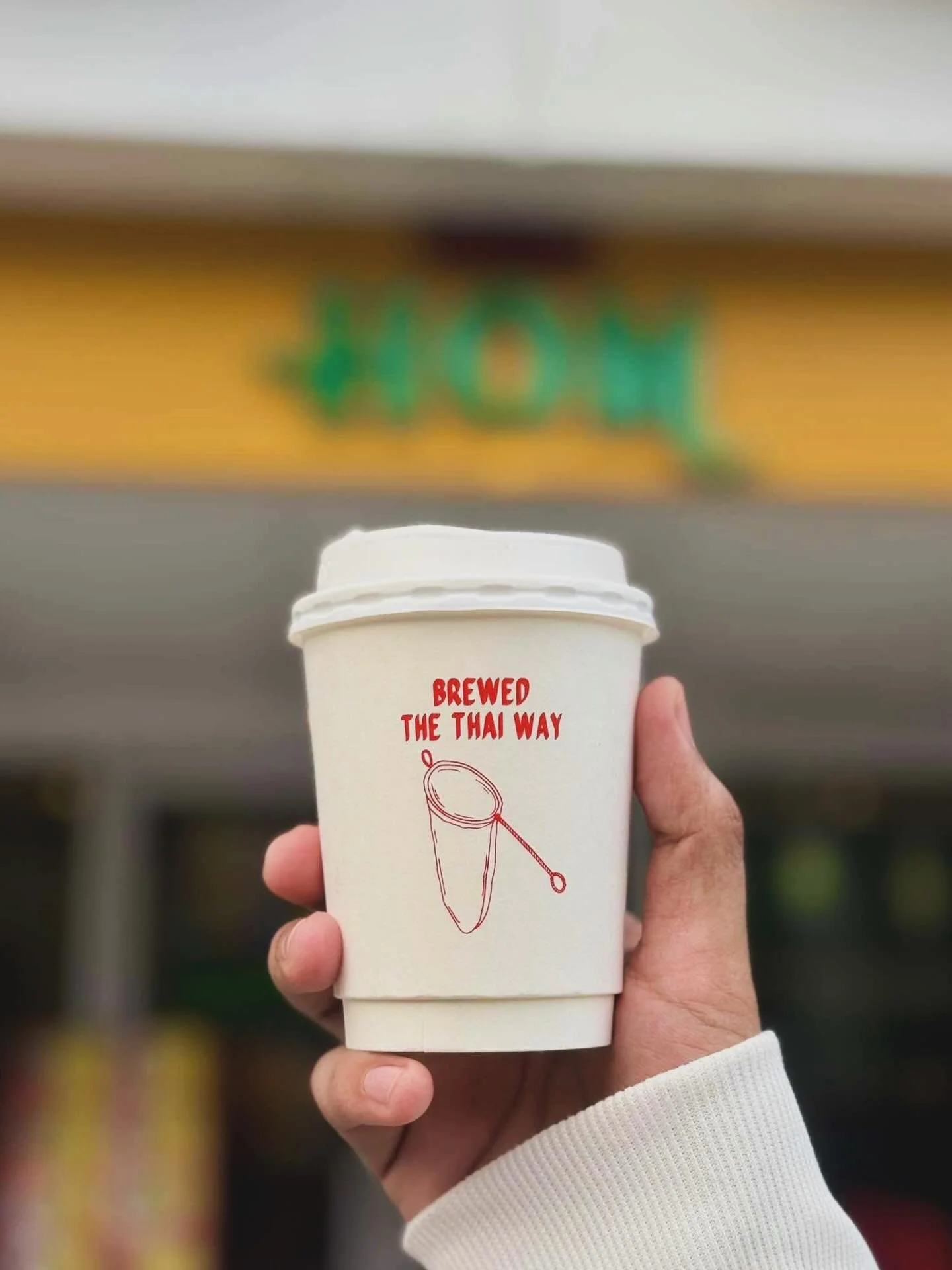 Hot Thai Coffee ☕️

Now served in our new double-wall cups that keep your hands comfy and your coffee hot!

Taste our bold yet smooth Thai Coffee, brewed the traditional Thai way using a cloth filter for a richer, rounder flavor.

The best part? It&r