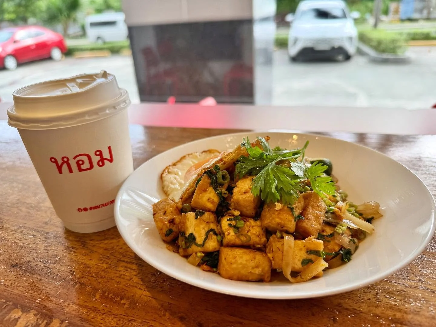 A clean, fresh way to wake up.
Real flavors, real comfort, real energy.

Veggie Pad See Ew with a crisp fried egg and hot coffee to ease you into the day. 🙏🏾