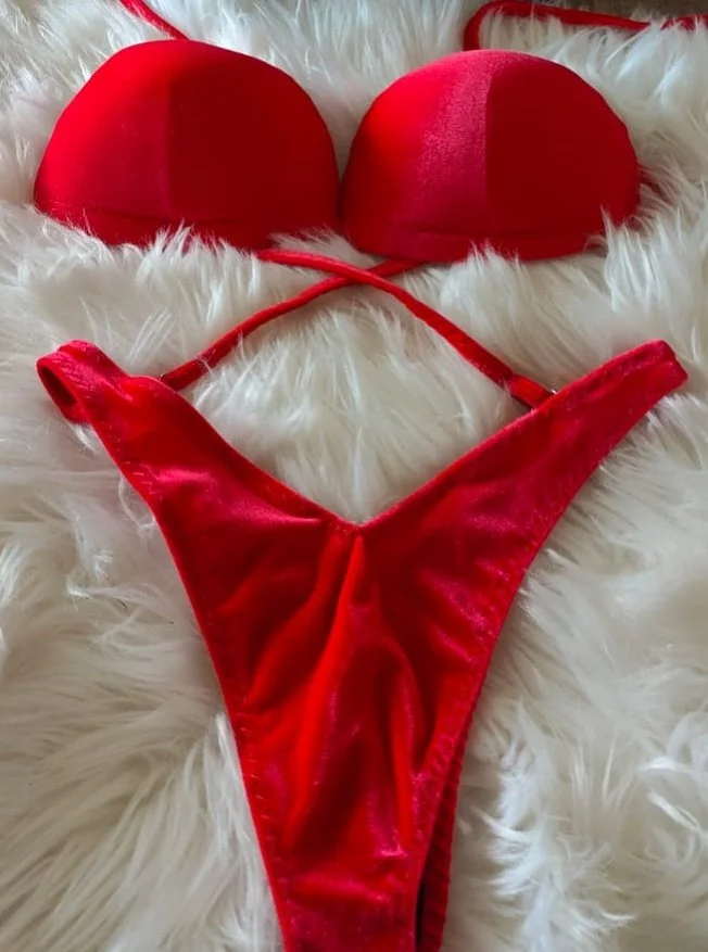 Red bikini on white fluffy fabric