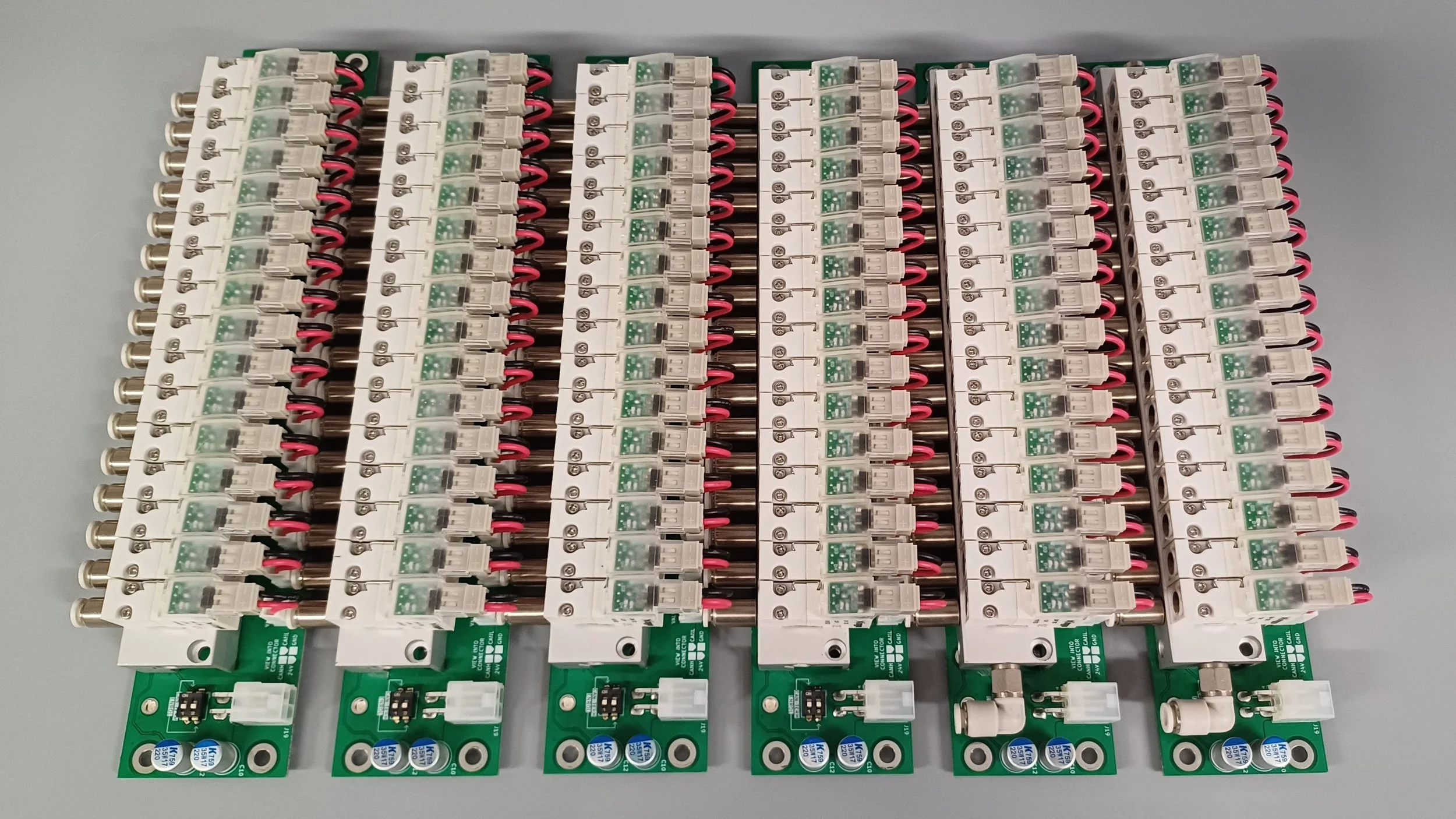 CAN 2.0 controlled, distributed micro pneumatic valve manifold blocks; high valve-count density applications, industry standard and custom communication protocols, electronic design, firmware engineering and manufacturing in Sussex, UK. Vacuum & air.