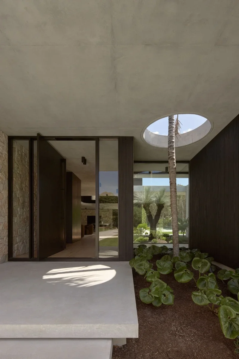Dining area with timber and stone finishes, Nojoor — HIVE Architecture Sunshine Coast architect