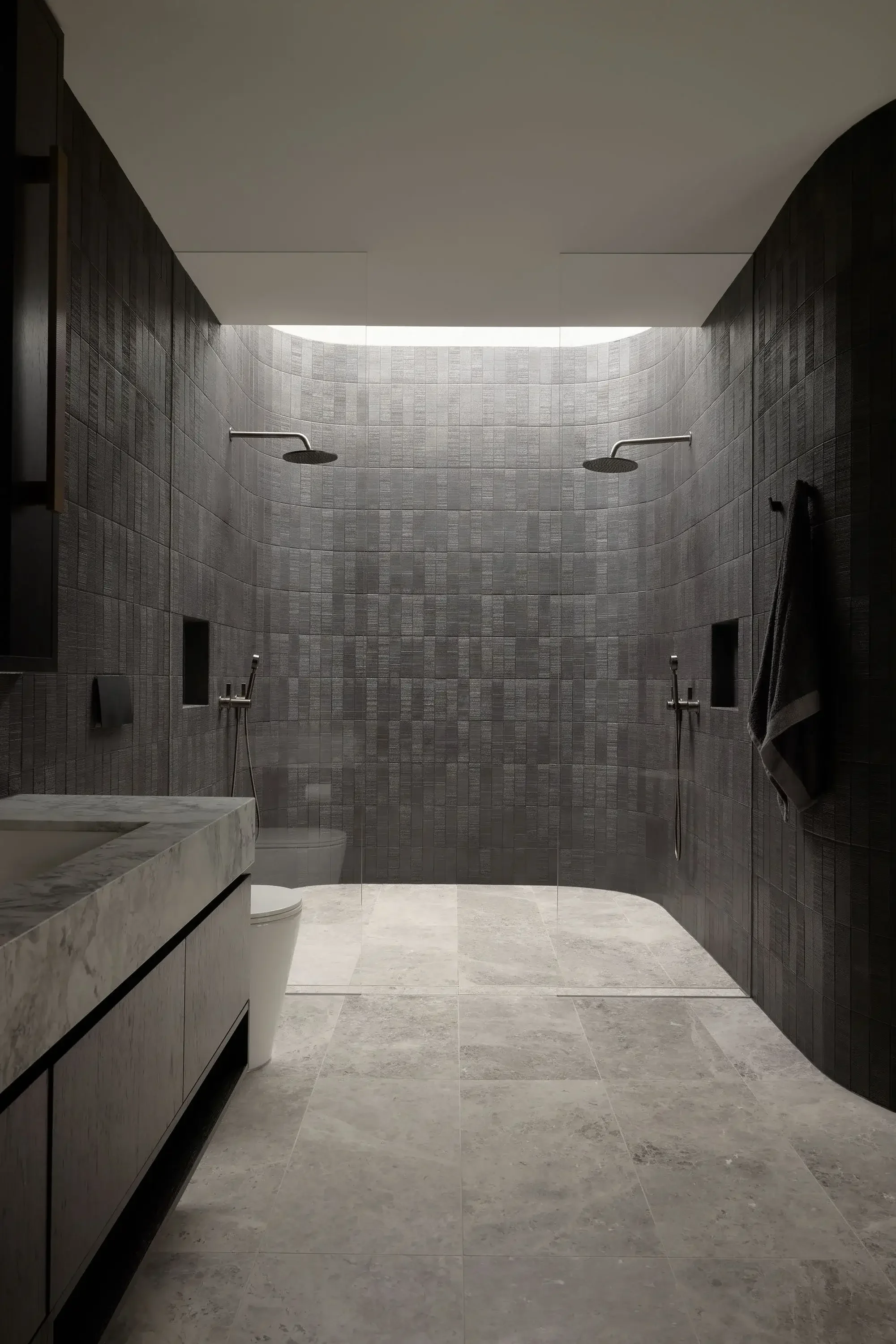 Bathroom with natural stone and timber joinery, bushland sanctuary home Sunshine Coast