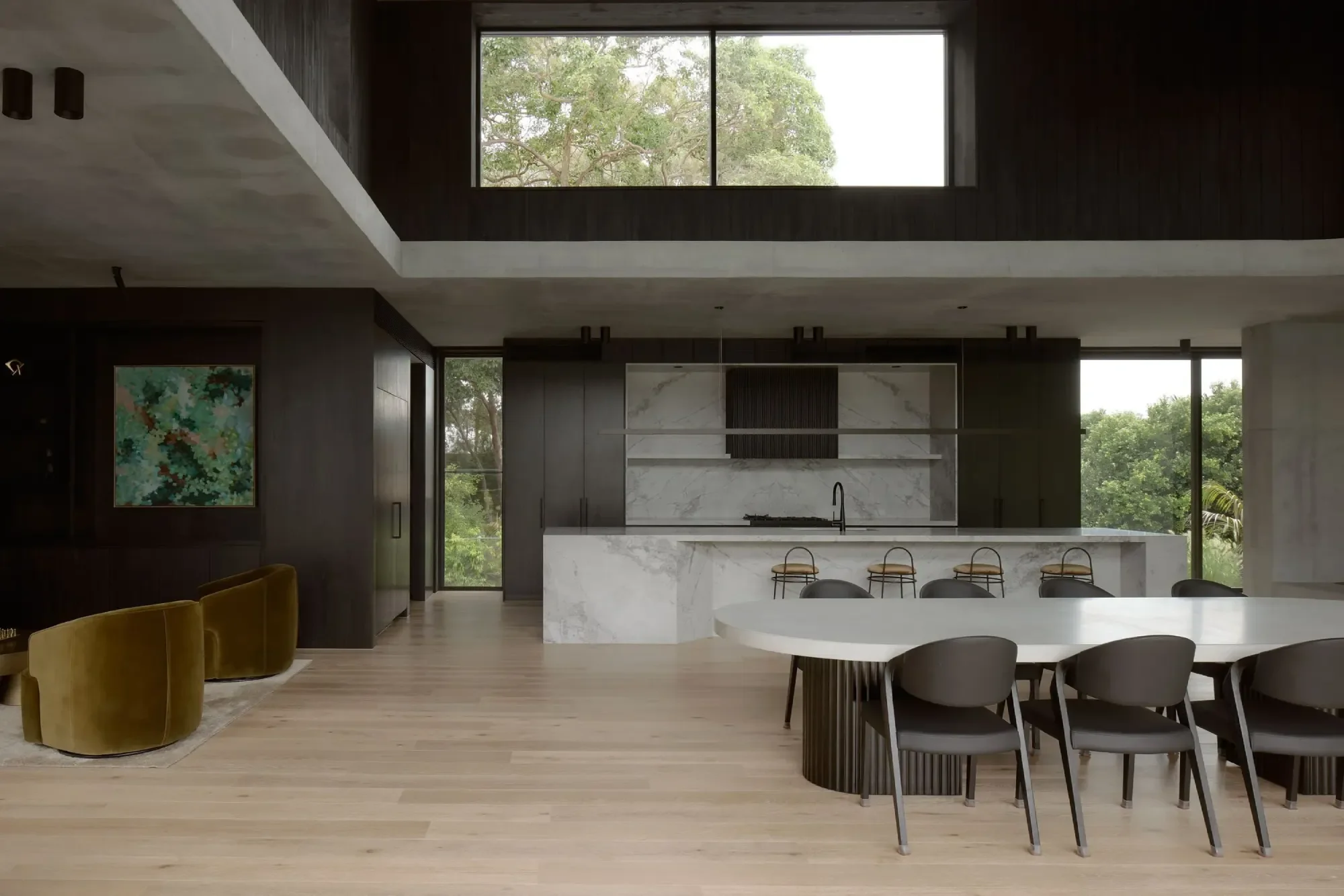 Dining area with timber and stone finishes, concrete table, Nojoor — HIVE Architecture Sunshine Coast architect