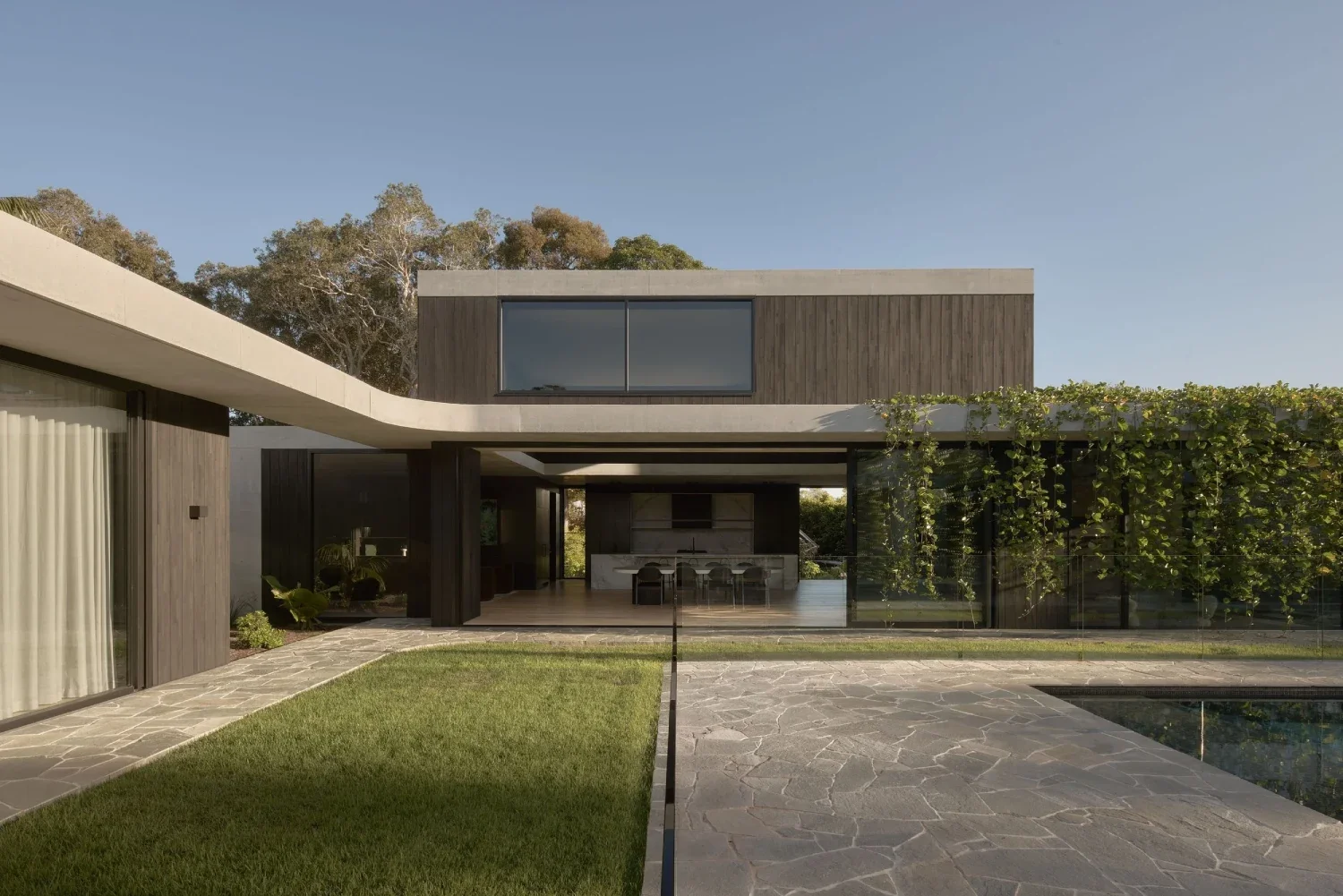 Contemporary bushland home with deep eaves and natural timber — HIVE Architecture Sunshine Coast architect