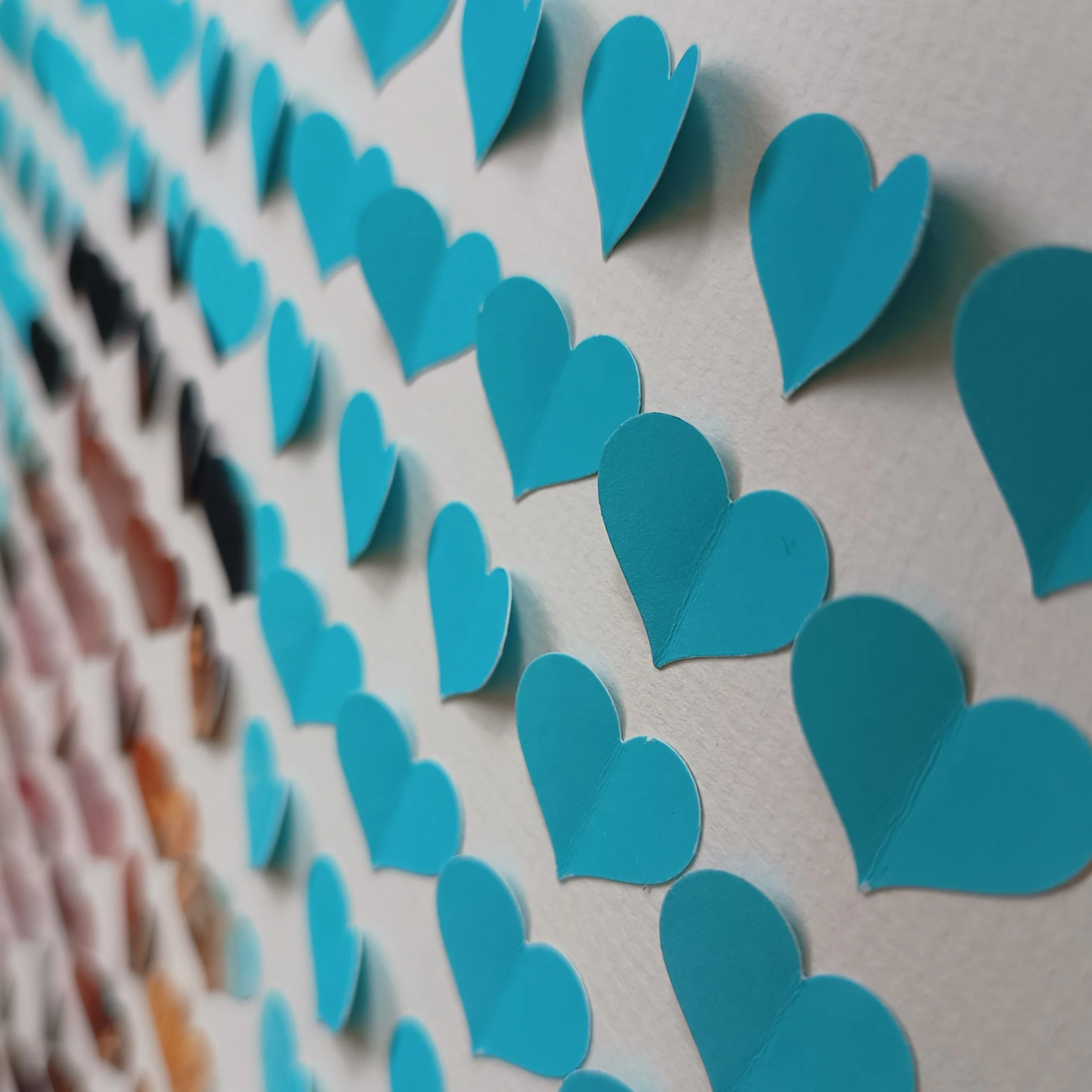 Blue hearts arranged in rows