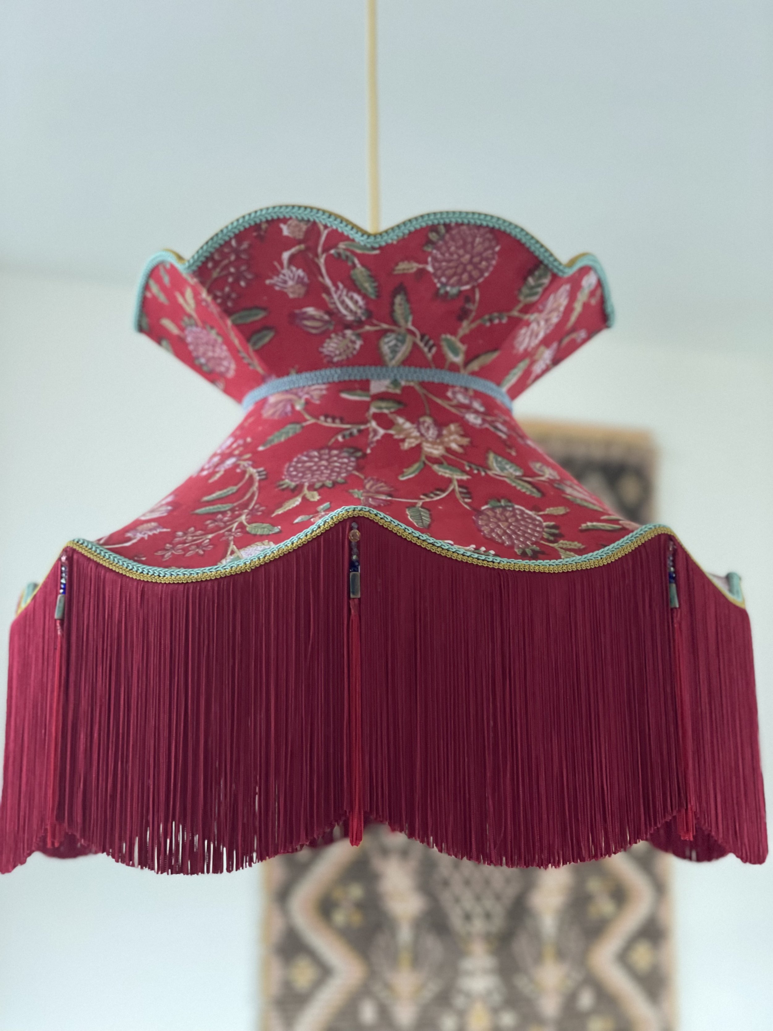 22' ballerina media in block print red and orange polka dot block print lining.