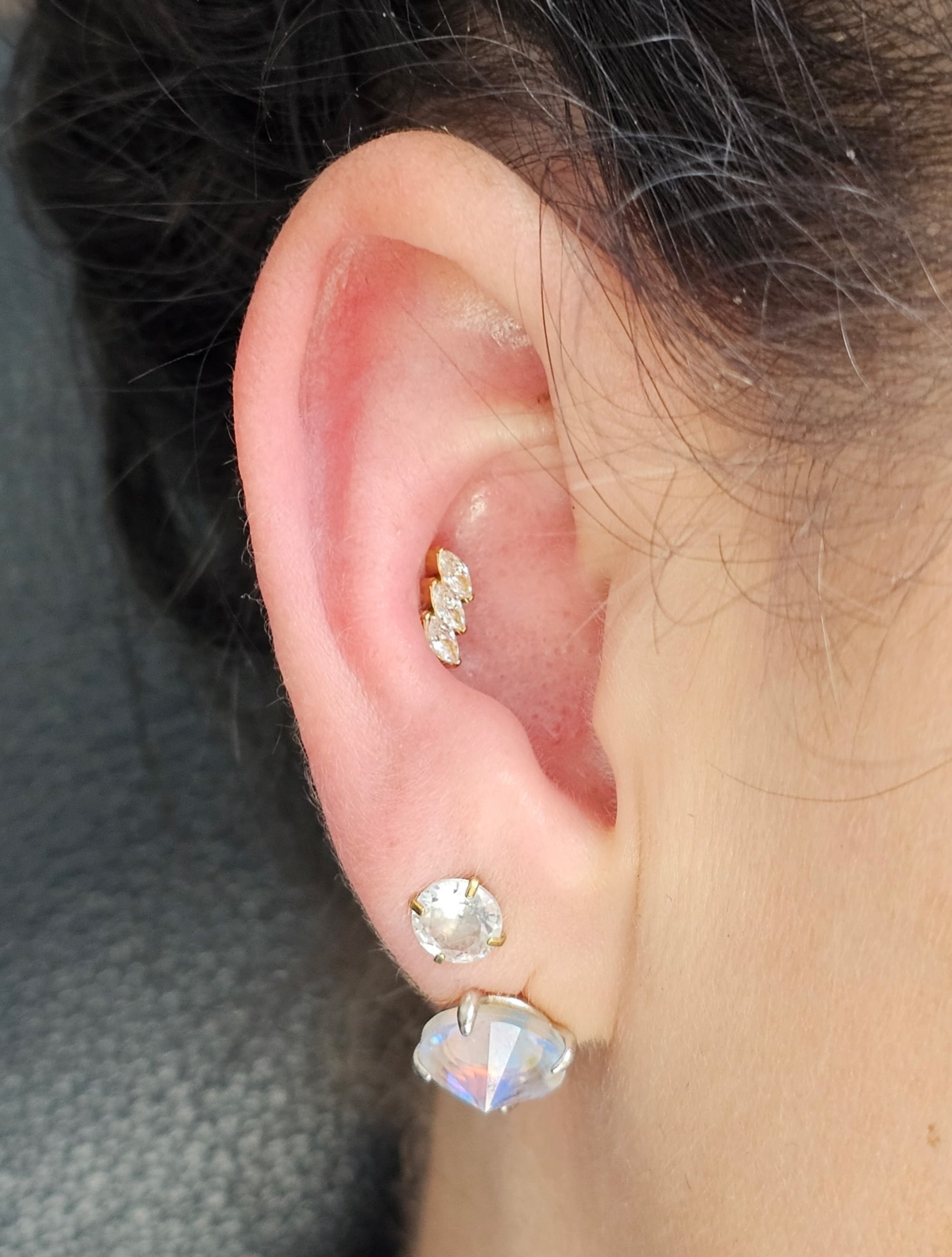 Courtney did a conch piercing on the lovely Victoria today. Happy (early) birthday! She chose this beautiful 14k yellow gold staggered cluster prong set marquise top. 

@piercingsbycourtney

To schedule a piercing, change out, free consultation, or p