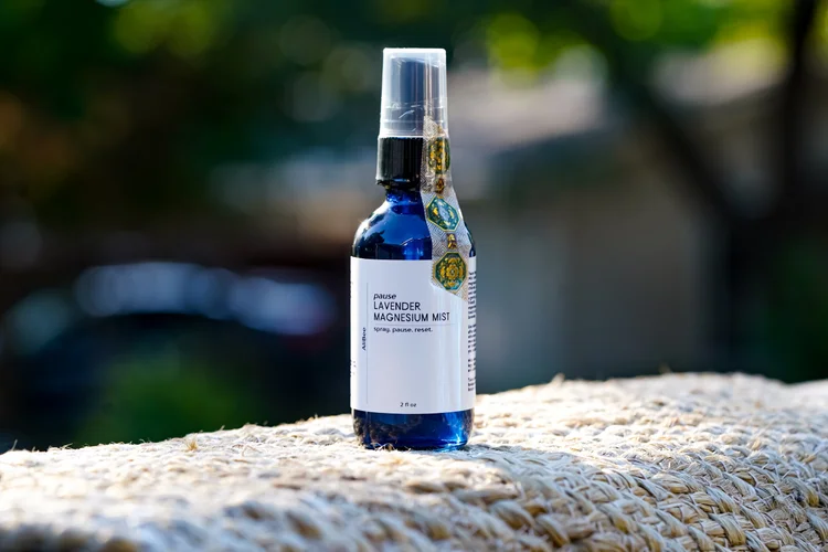 Pause: Magnesium Mineral Mist in an indigo glass bottle