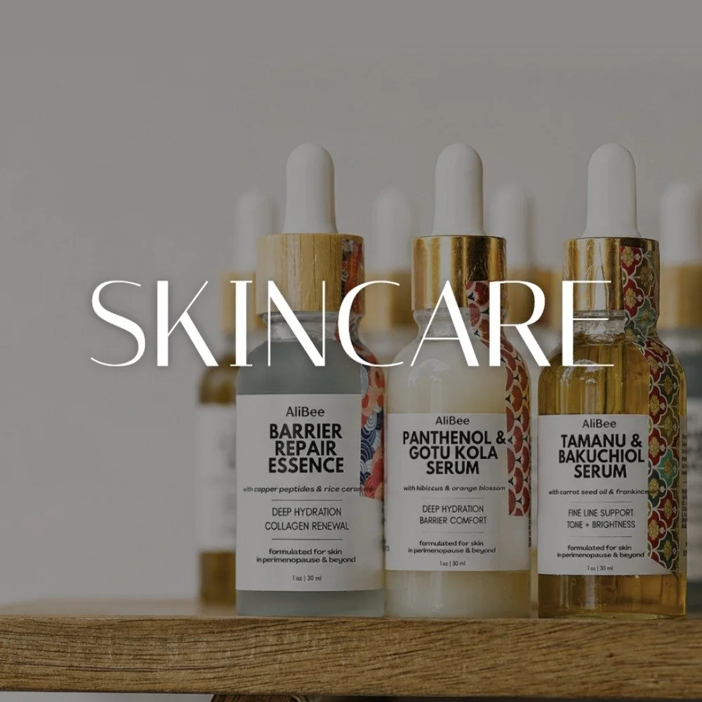 AliBee Barrier Repair Essence, Panthenol and Gotu Kola Serum, and Tamanu and Bakuchiol Serum on a wooden shelf
