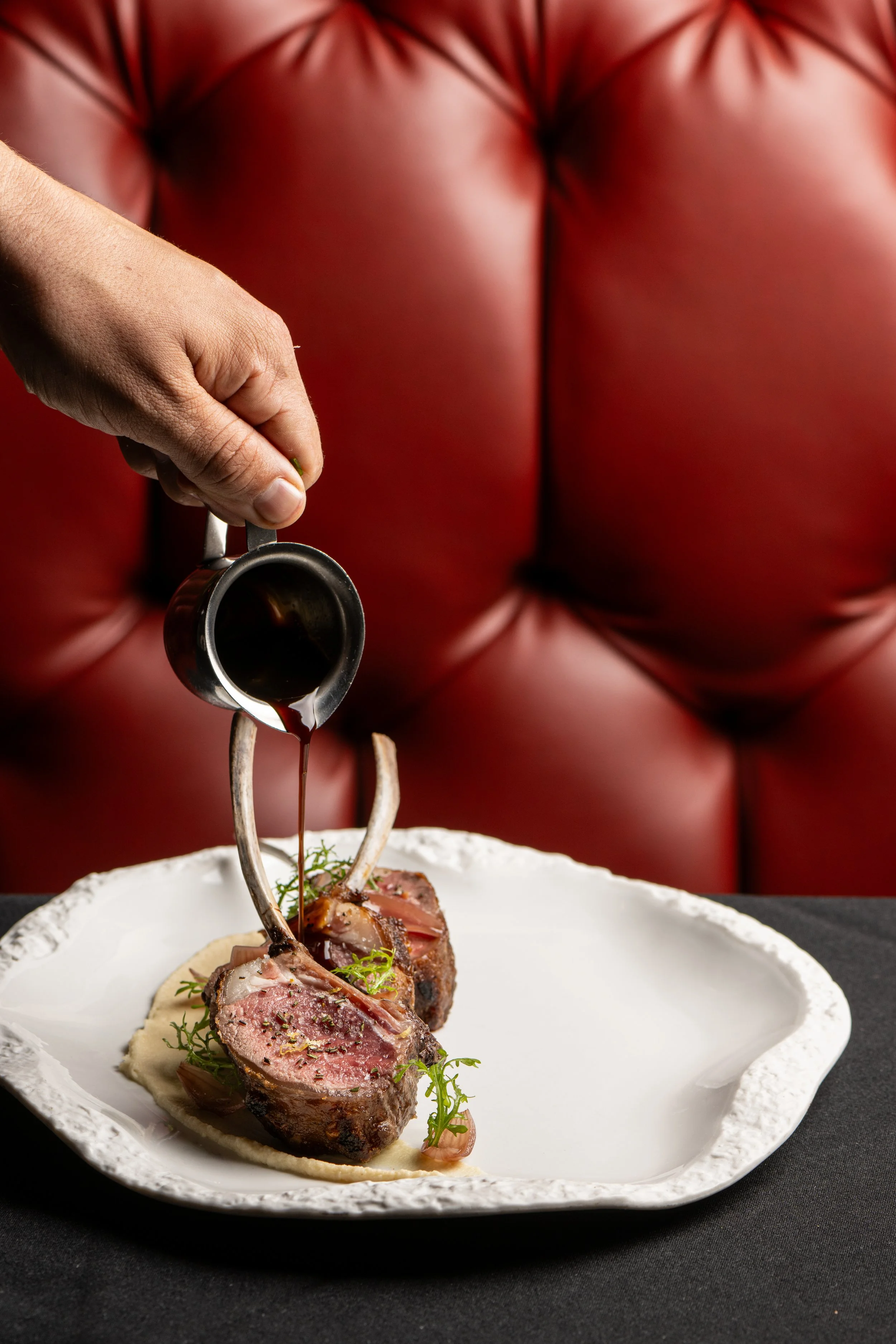 Dry Aged Colorado Lamb Rack, Celery Root Soubise, Pickled Pearl Onions, Rosemary Jus