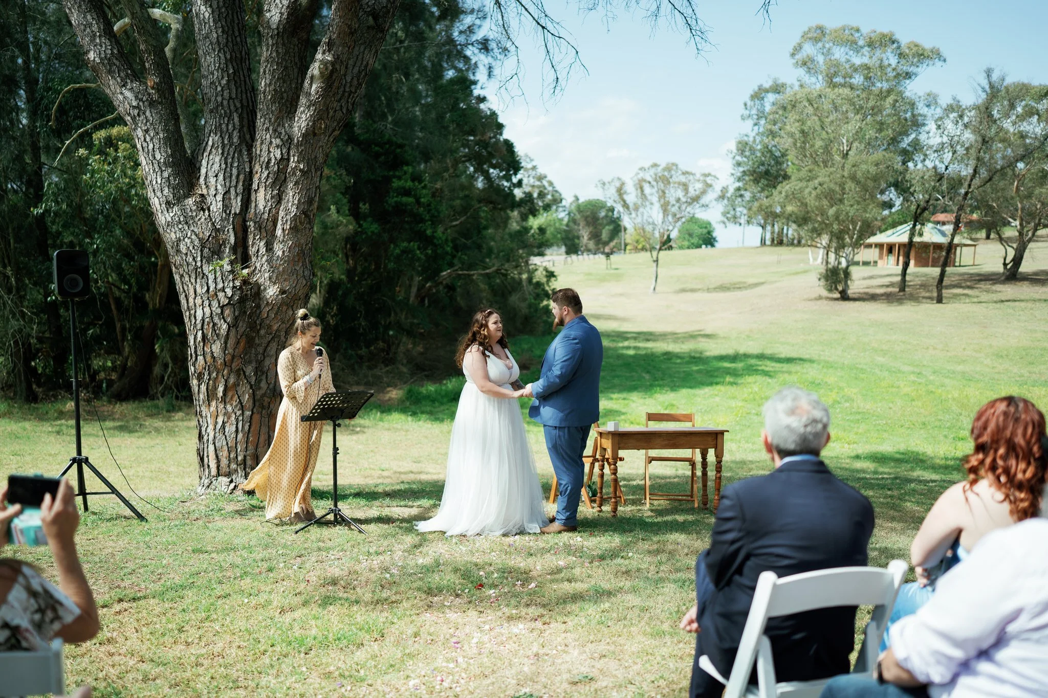 Bride and Groom Exchanging Vows at Stockade Hill Heritage Park Wedding Ceremony