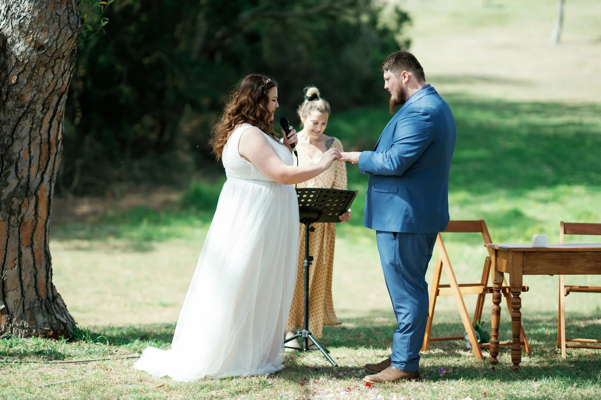 Bride and Groom Exchanging Vows at Stockade Hill Heritage Park Wedding