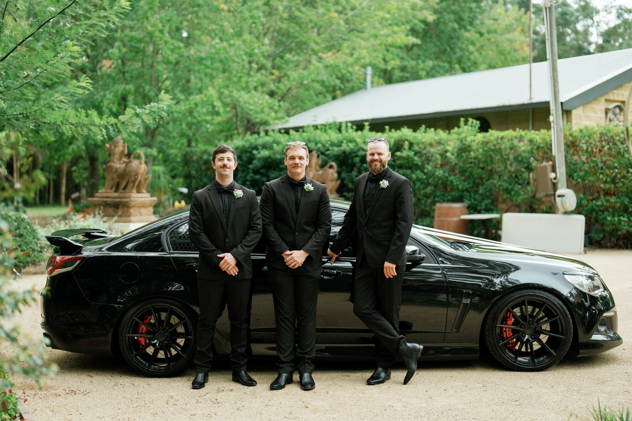 Groomsmen with Classic Black Wedding Car at Kangy Gardens