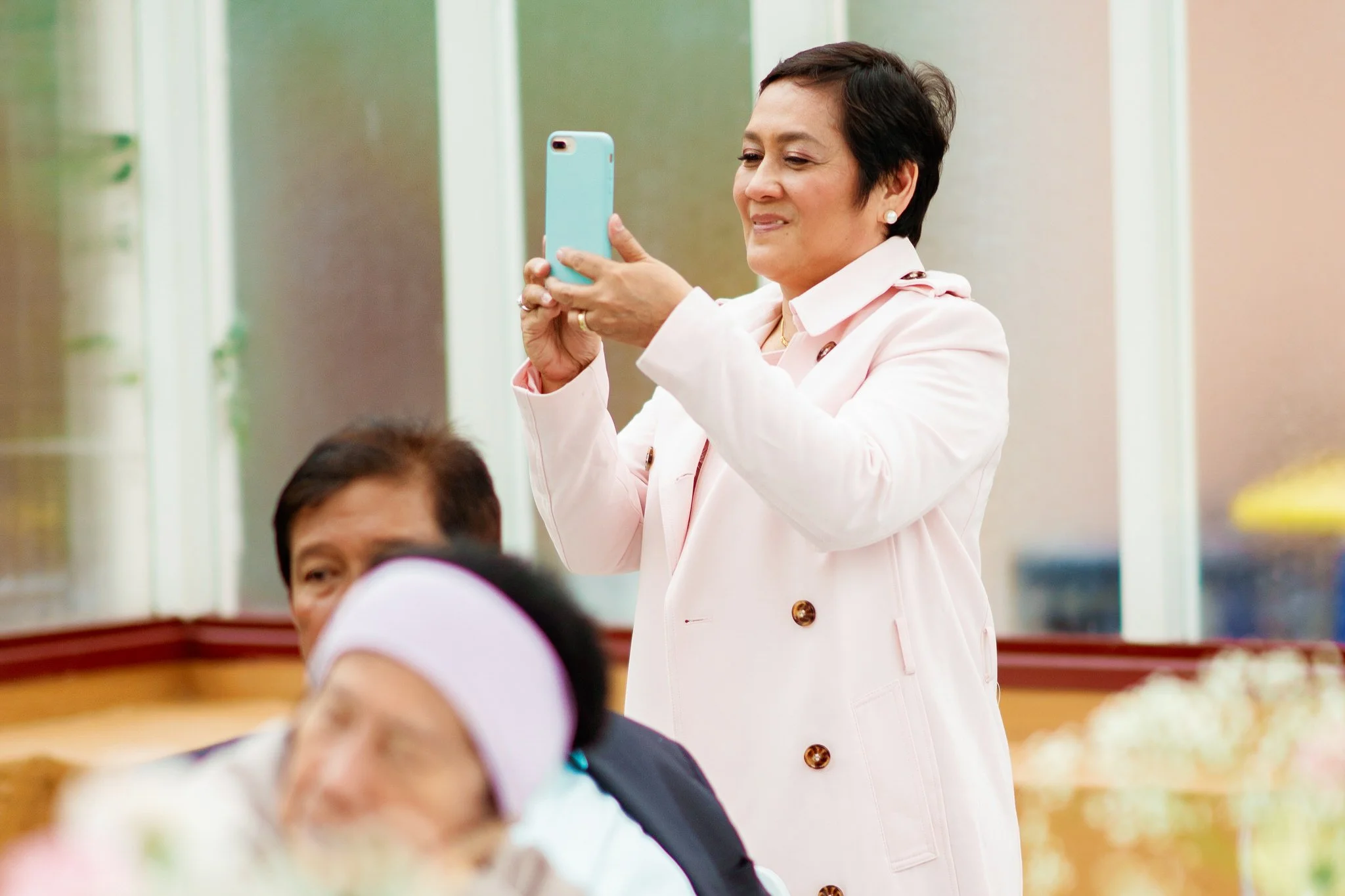 Guests of the bride capturing wedding memories at Palm House, Botanic Garden Sydney