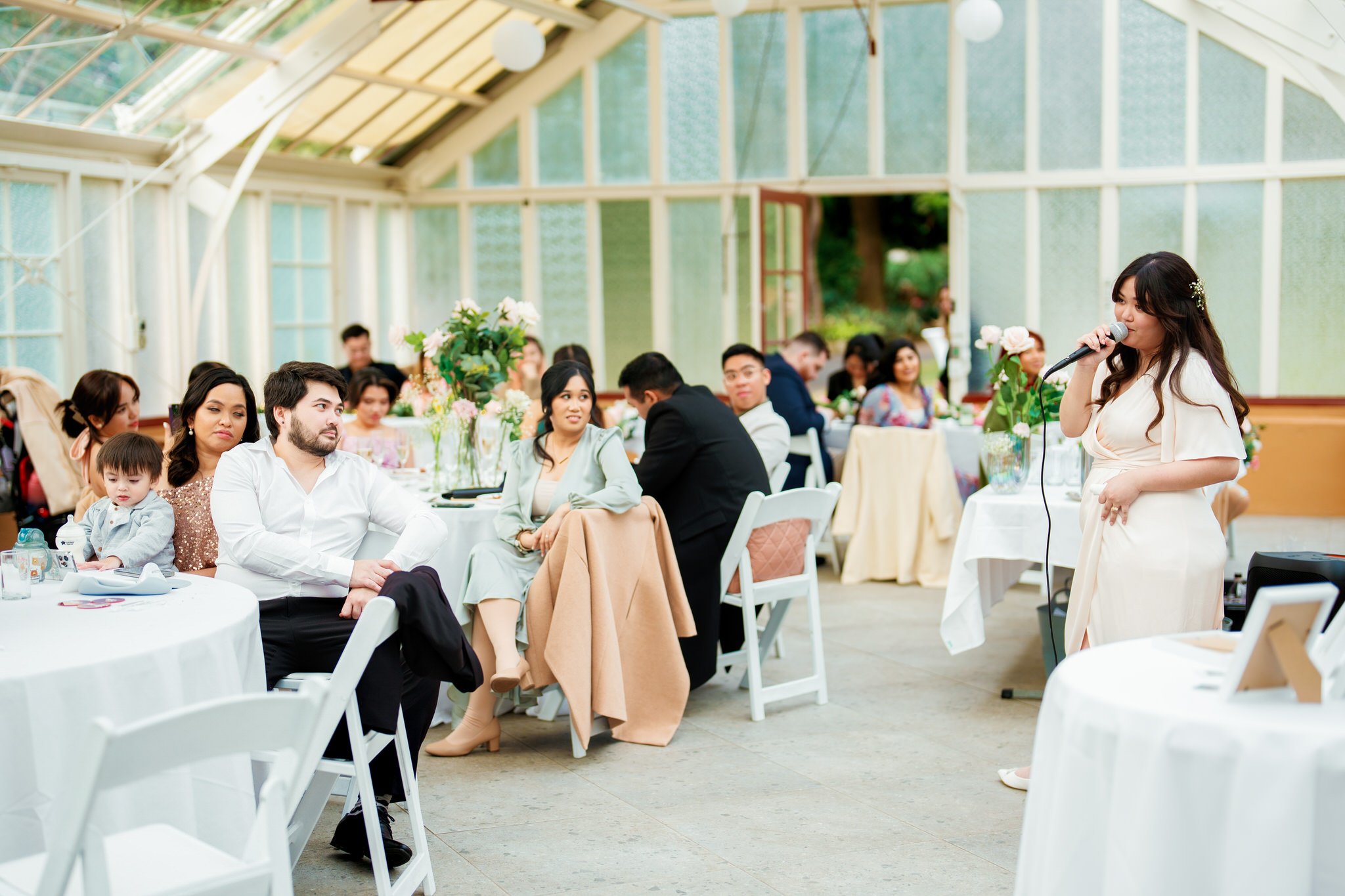 Candid moments during Palm House wedding reception at Sydney Botanic Garden