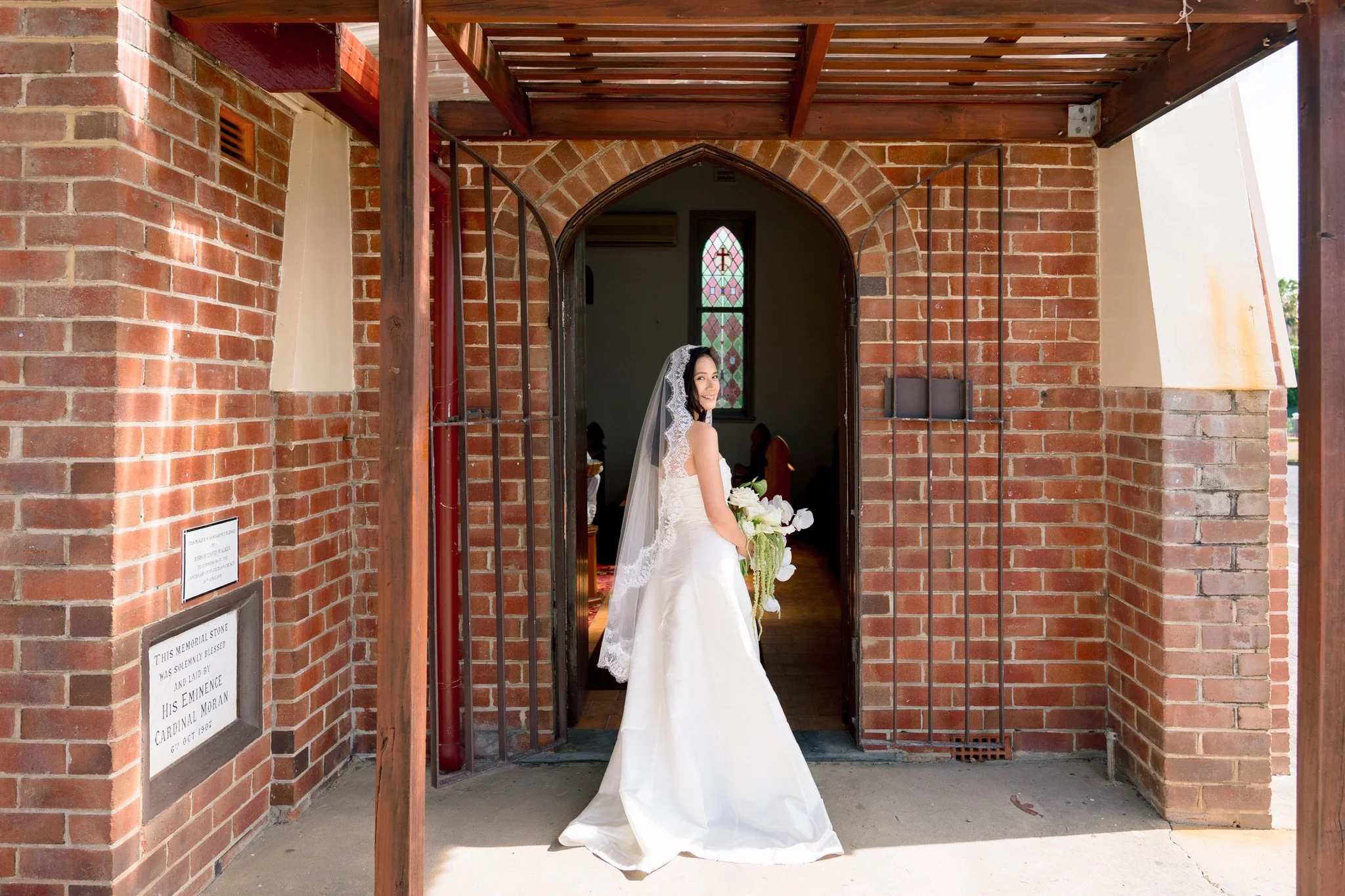 Bride at St Cecilia’s Church entrance