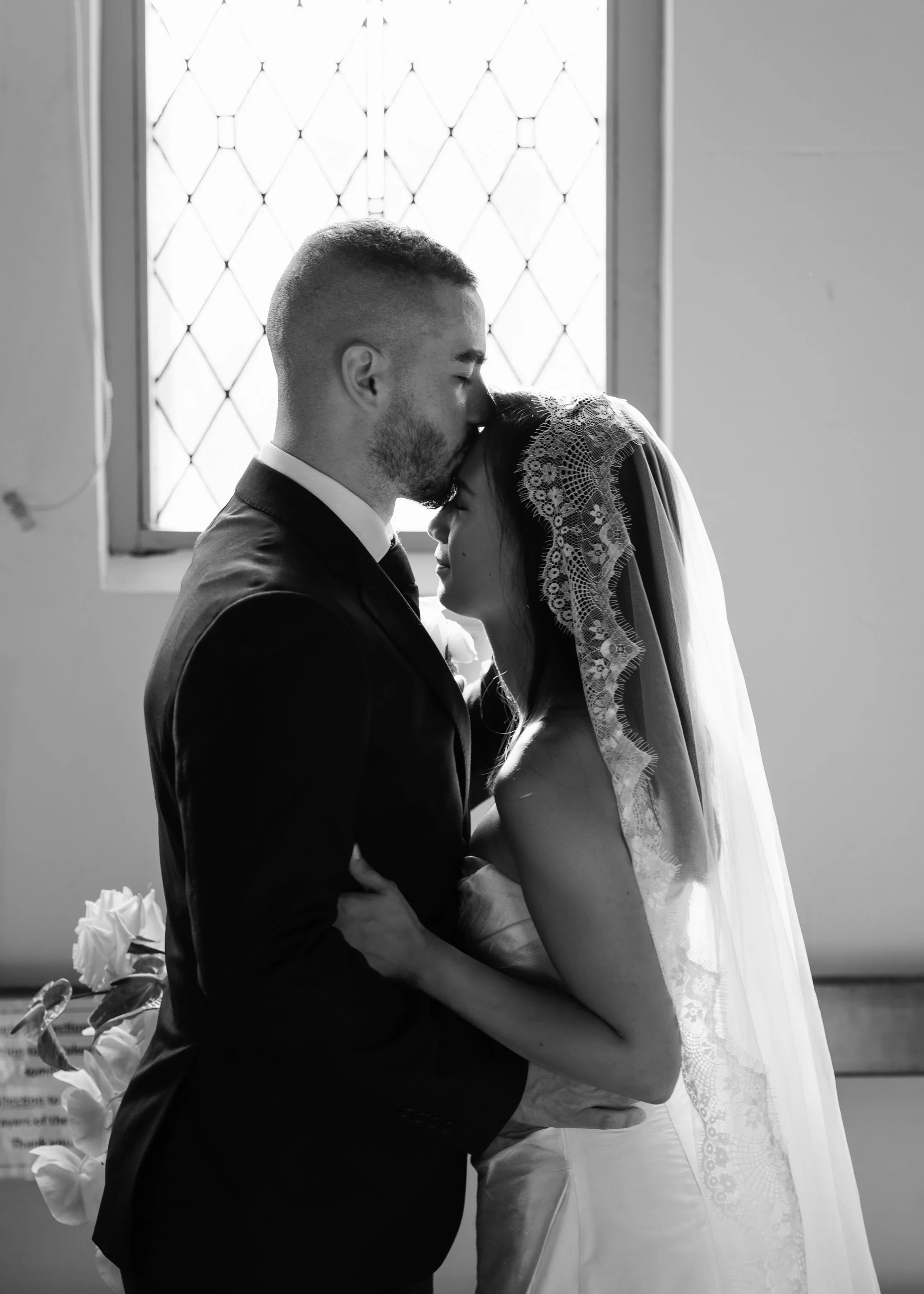 Forehead kiss black and white St Cecilias