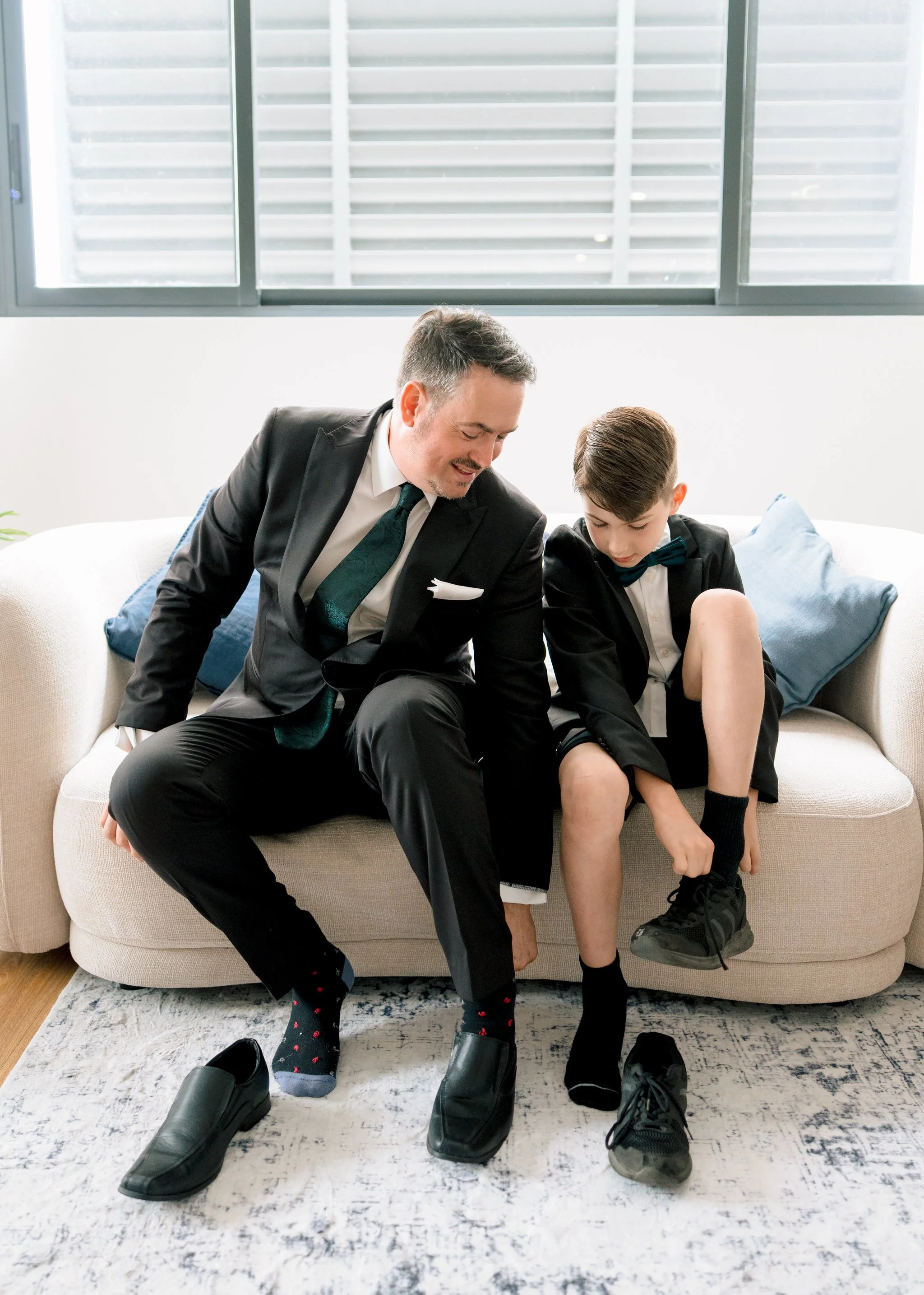 Groom getting ready wedding moments