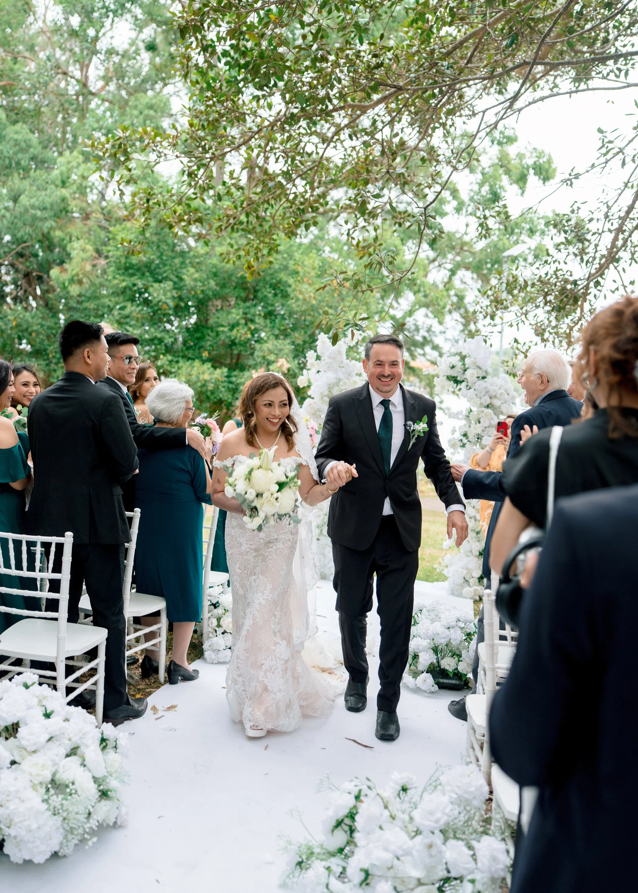 Post-ceremony congratulations at Angelo’s Cabarita