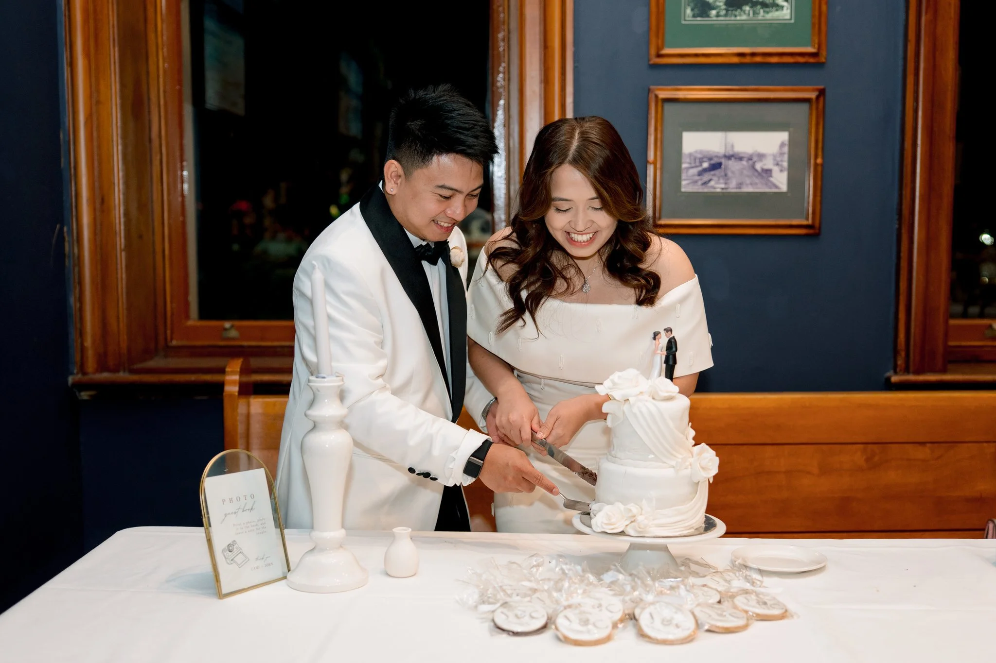 Wedding cake cutting at Customs House Hotel