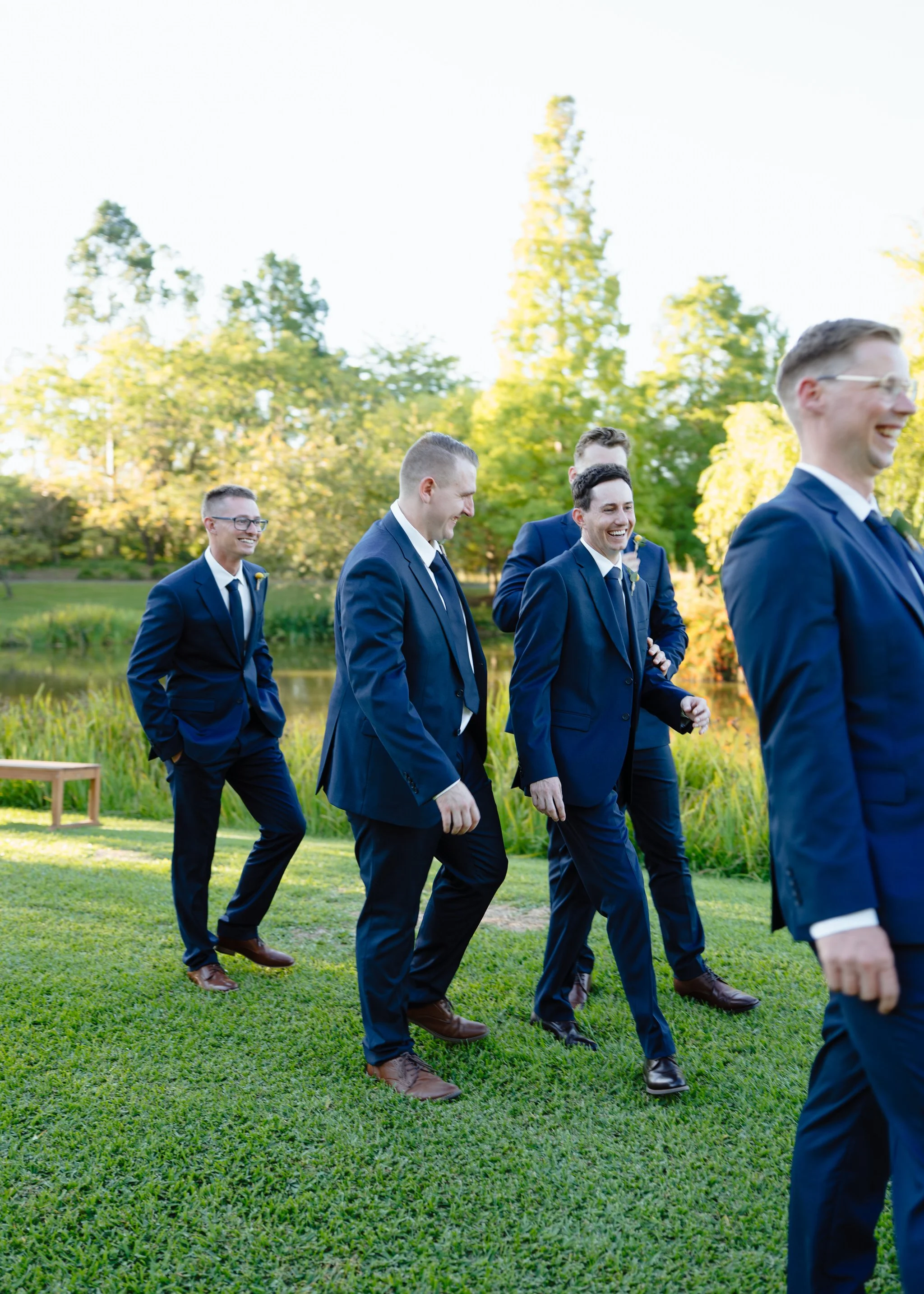 Groomsmen Walking Hunter Valley Gardens Wedding