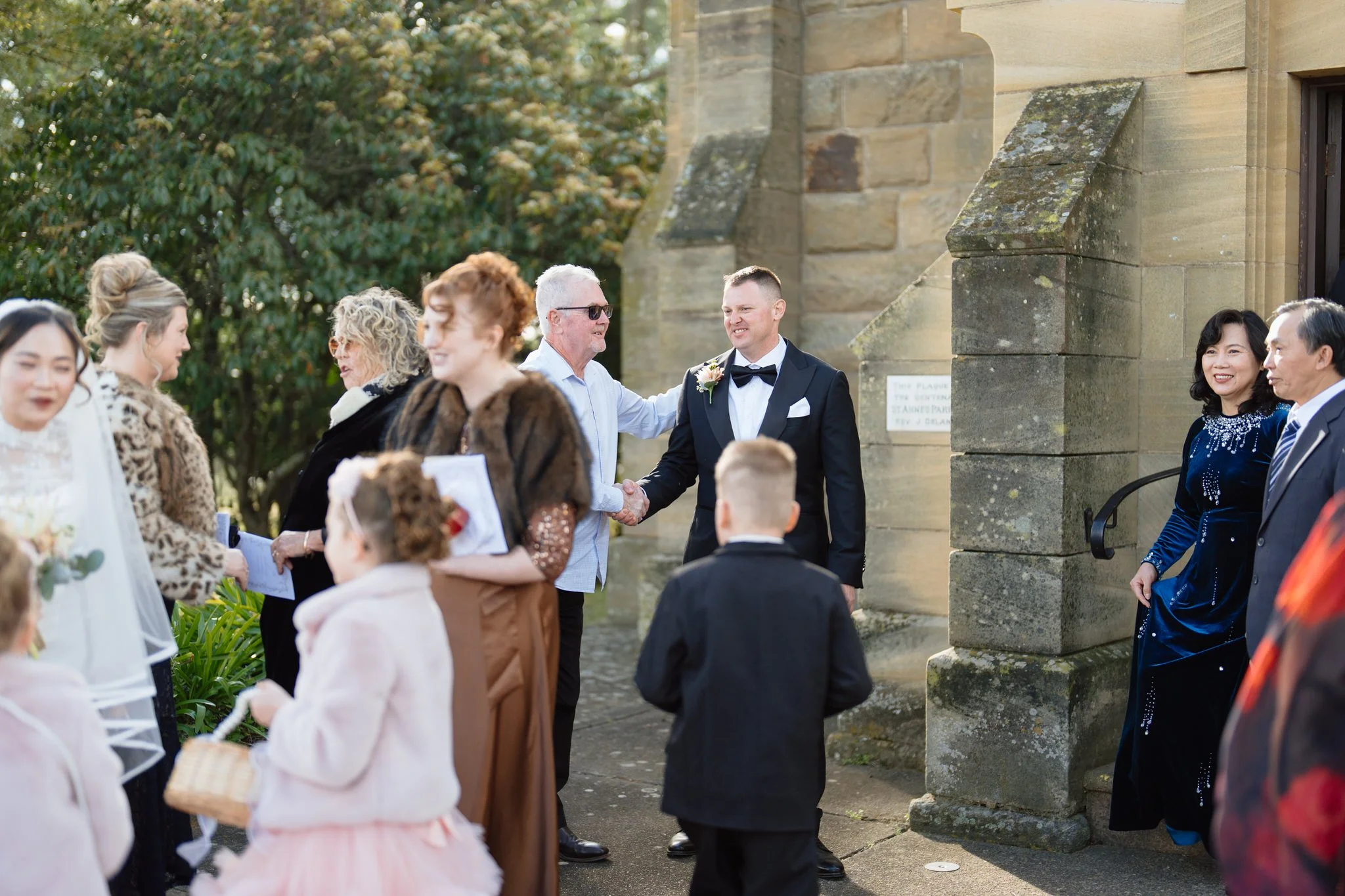 Groom Greeting Guests Outside Merriwa Catholic Church