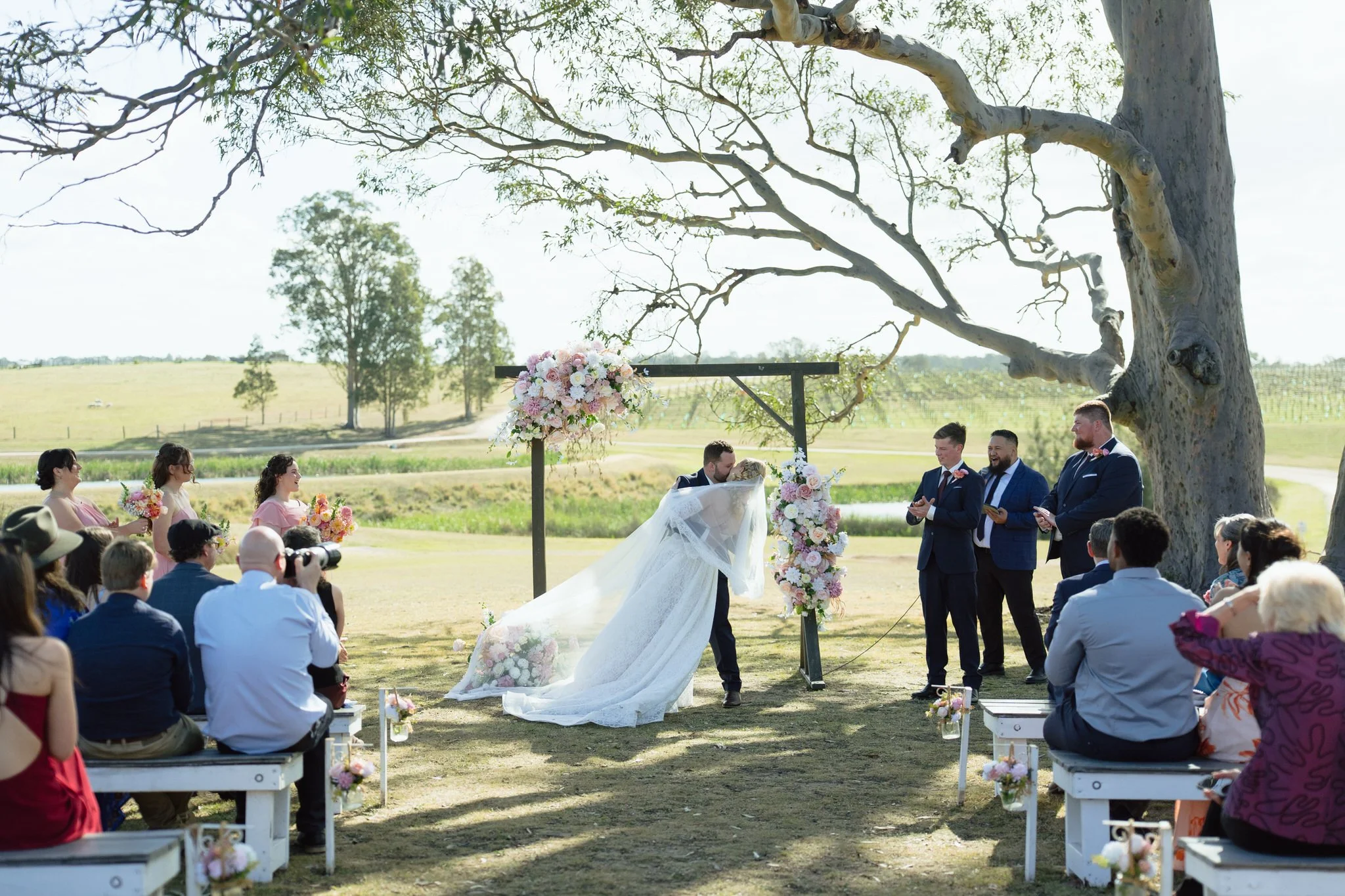 Wedding Ceremony Kiss at Squire's Vineyard