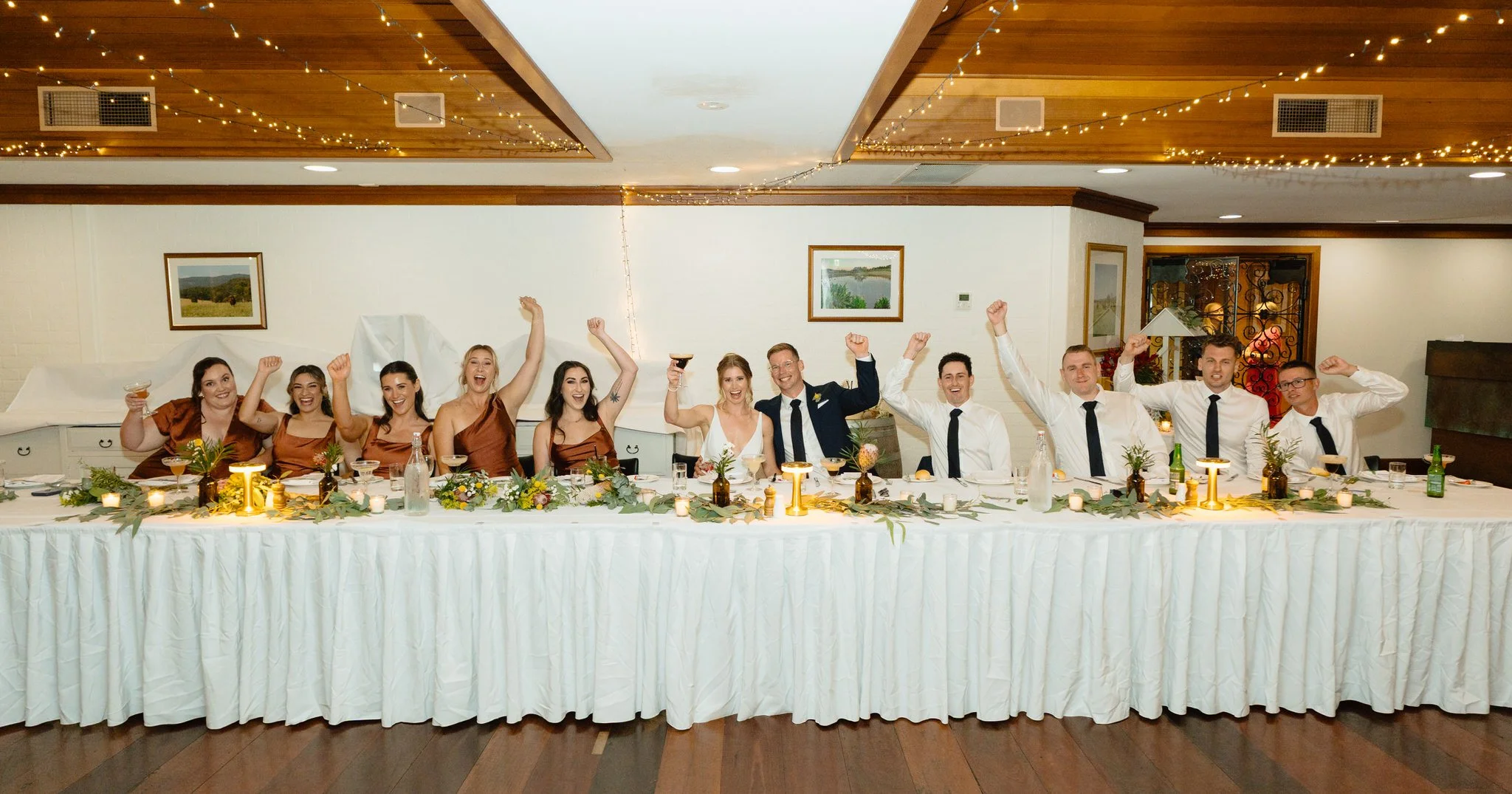 Bridal party cheering reception table Hunter Valley wedding