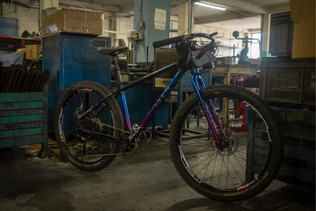 Bike product shot in workshop.png