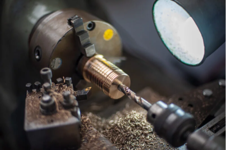 Bike fabrication boring a hole.png