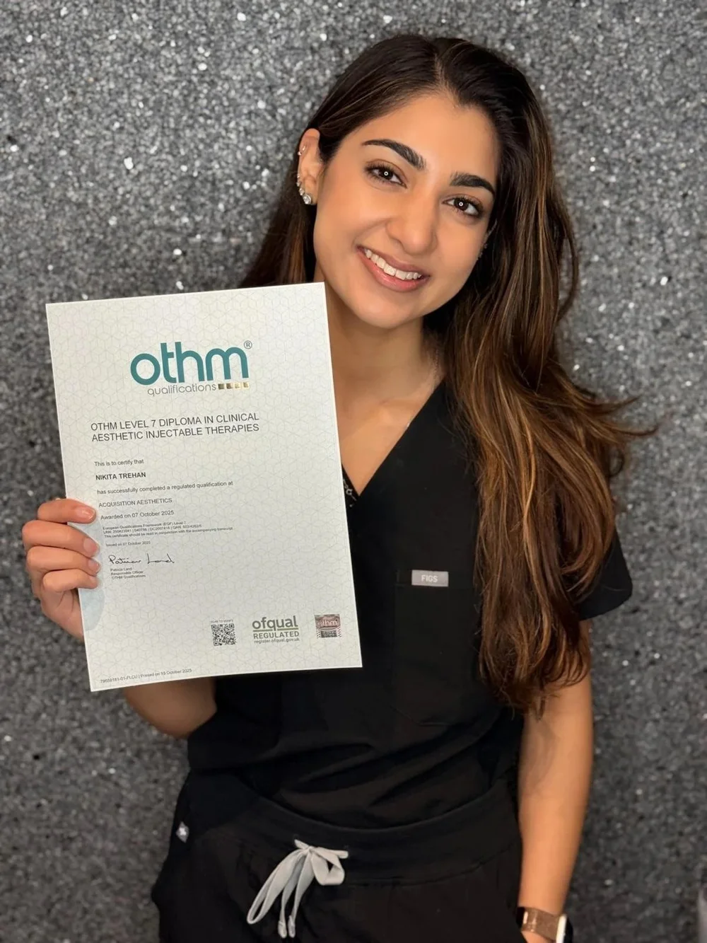 Nikita Trehan, Physician Associate, holding her Level 7 Diploma in Aesthetic Medicine