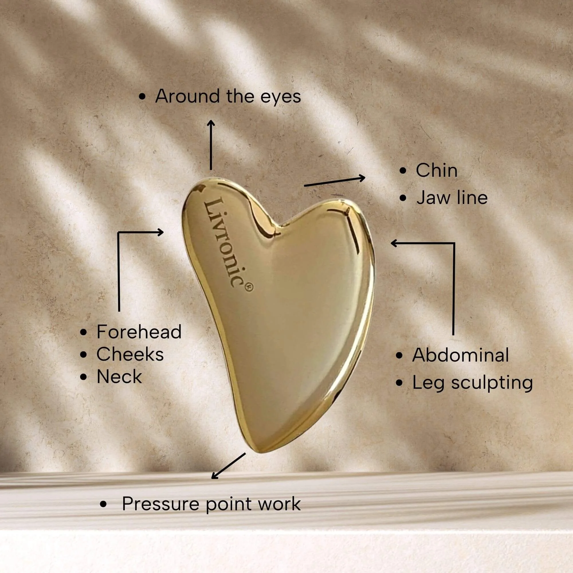 Livronic® Kansa (Bronze) Gua Sha facial tool for natural lifting, sculpting, and firming, reducing puffiness, promoting collagen, and enhancing skin radiance. Instructions on how to use the tool.