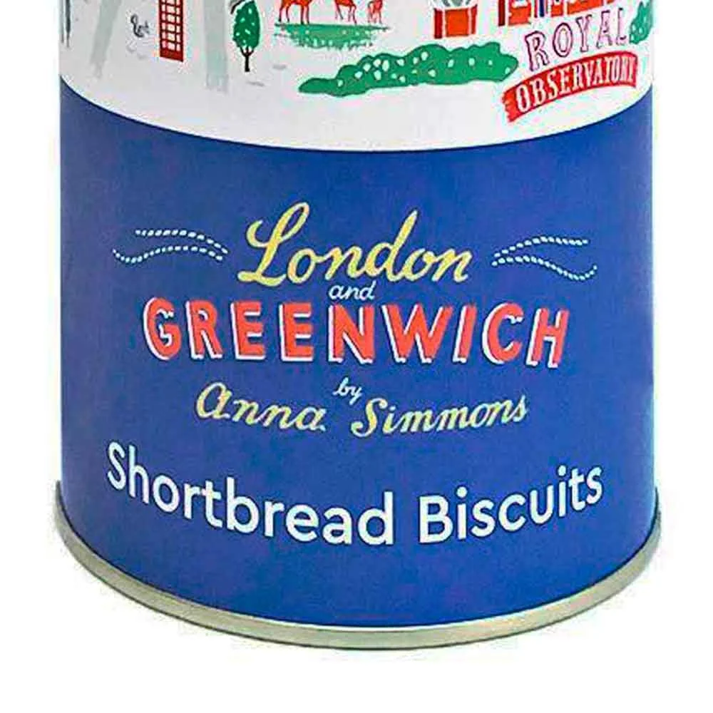 Photograph of the base of a blue biscuit tin displaying orange, yellow, and white heritage-inspired hand-lettered “London and Greenwich by Anna Simmons”, illustrated by Anna Simmons