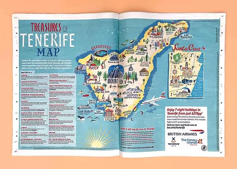 Photograph of a Metro newspaper spread on a coral background, showing a colourful Tenerife map illustration by Anna Simmons, hand lettered with the words Treasures of Tenerife map, with landmarks and travel tips.