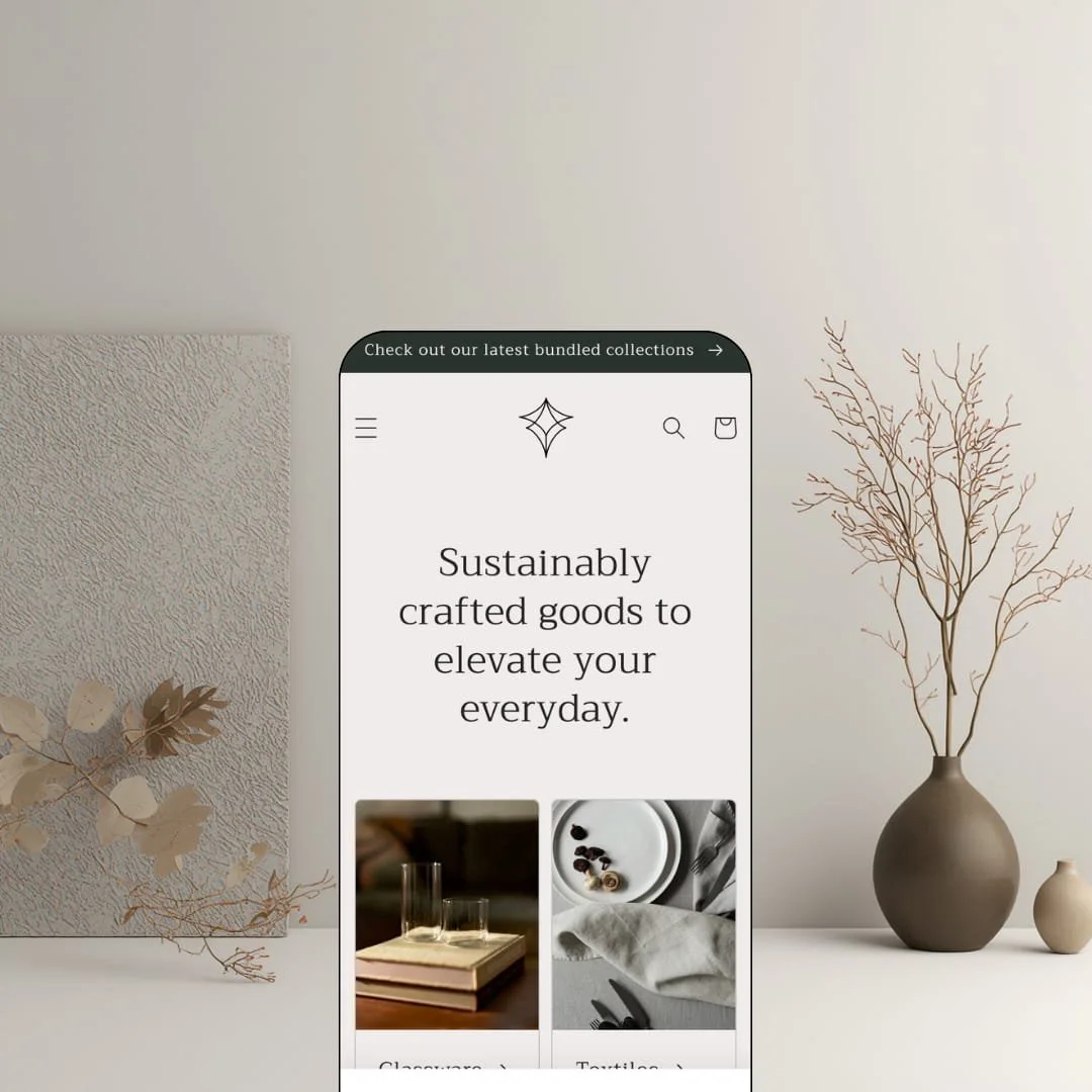 Craft Shopify theme mobile preview — single homeware preset with a centered serif hero above glassware and textile collection tiles.