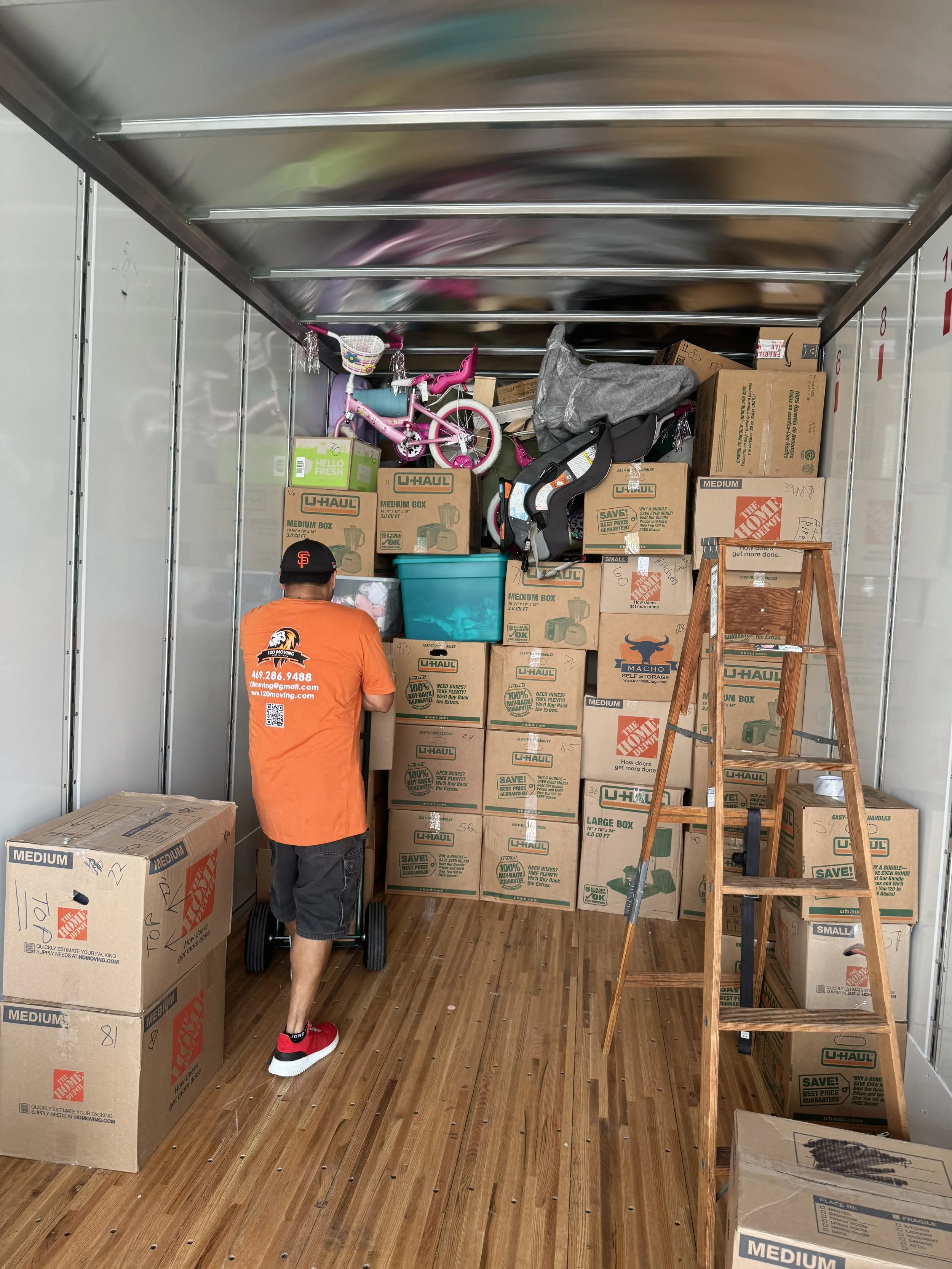120 Mover strategically packing boxes