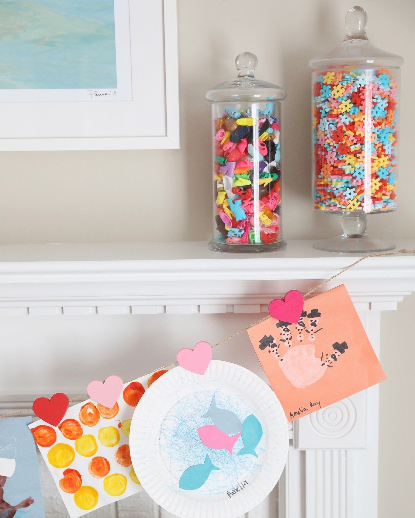 Who says you cannot decorate with barbie shoes. 
Design- Kerry Seely Design
Project- Meadowbrook playroom
Photo- Anne Constance Photography