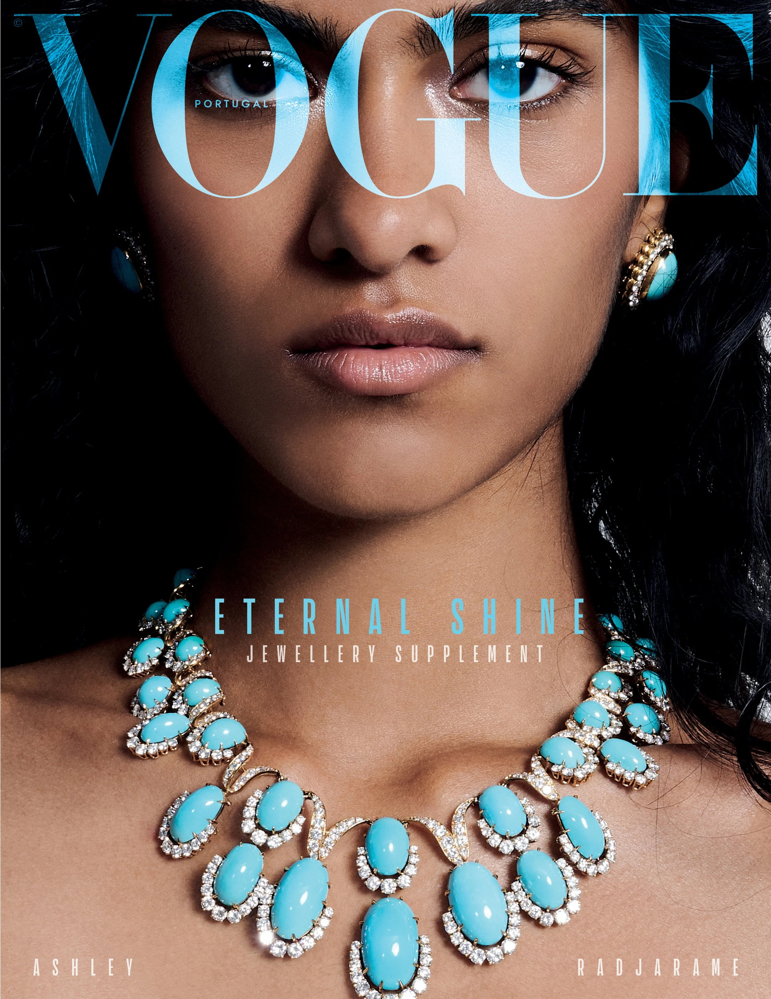 Vogue magazine cover featuring a woman with dark hair and blue eyes, wearing turquoise jewelry including earrings and a necklace, with the tagline 'Eternal Shine Jewelry Supplement.'