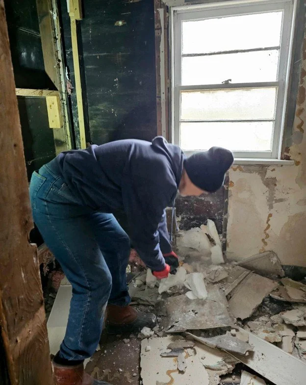 Mark gutting the bathroom.jpg