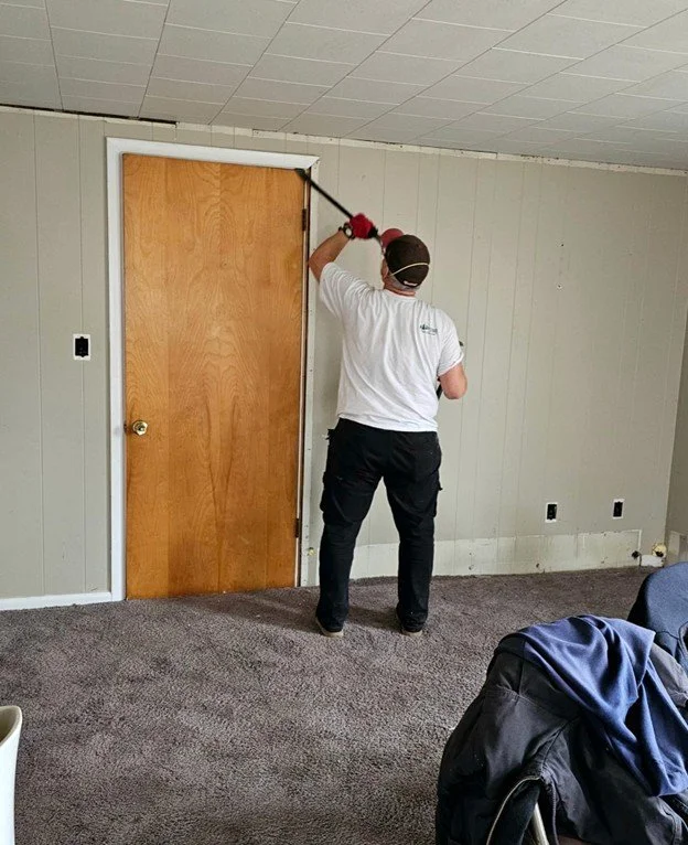 Pastor Greg working in the living room.jpg