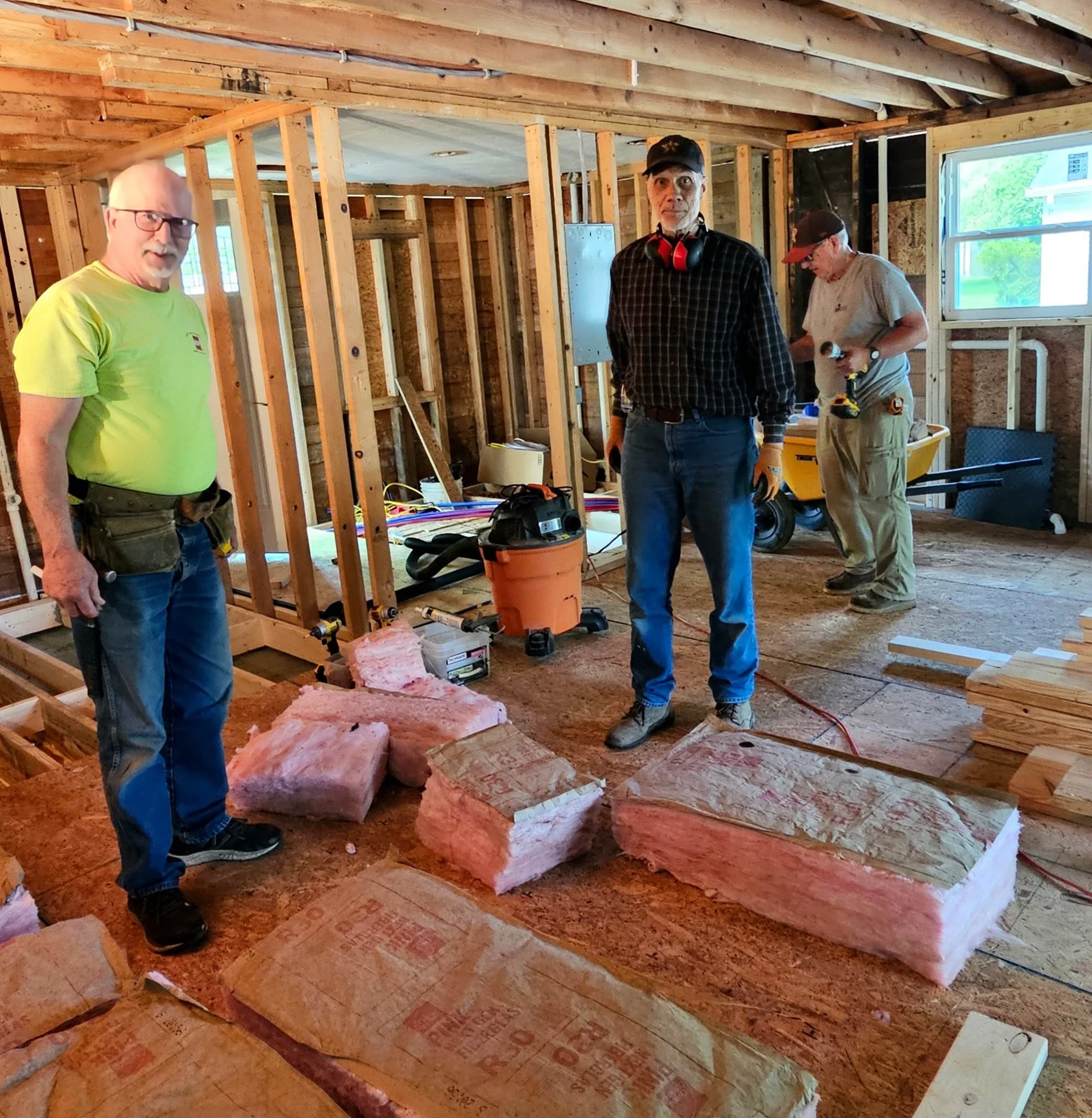 Putting in flooring and insulation.jpg