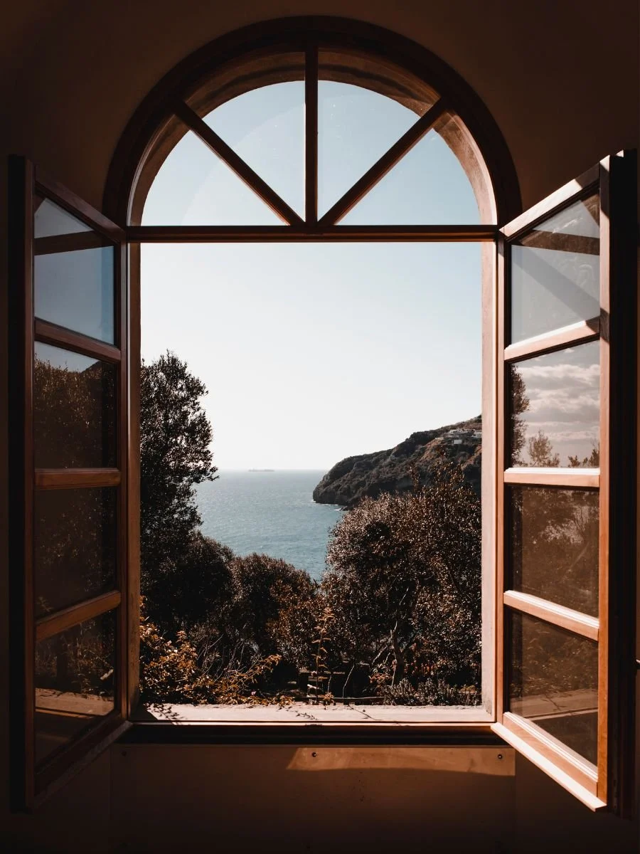 open window looking onto water