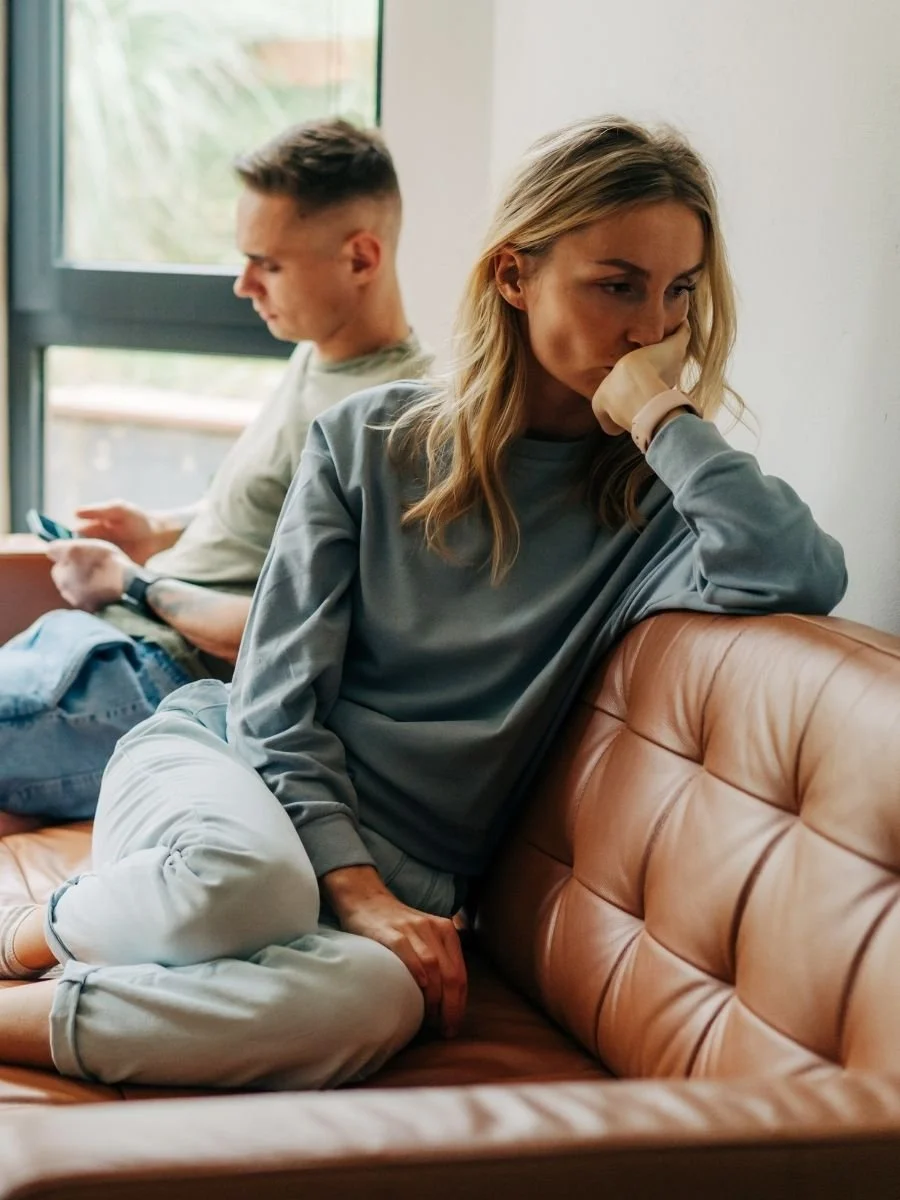 Woman with trust issues turning away from her partner