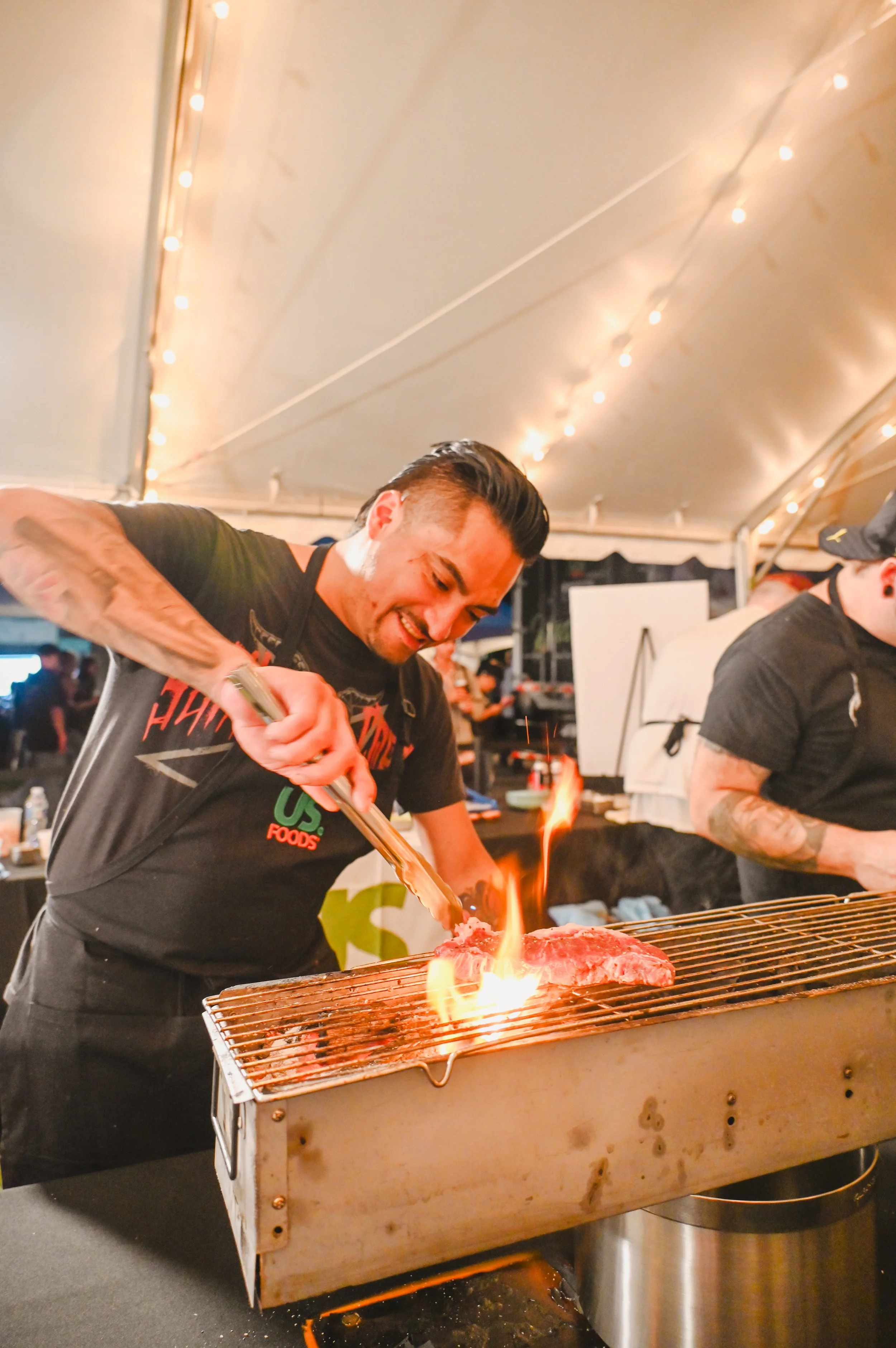 Chef cooking over open flame